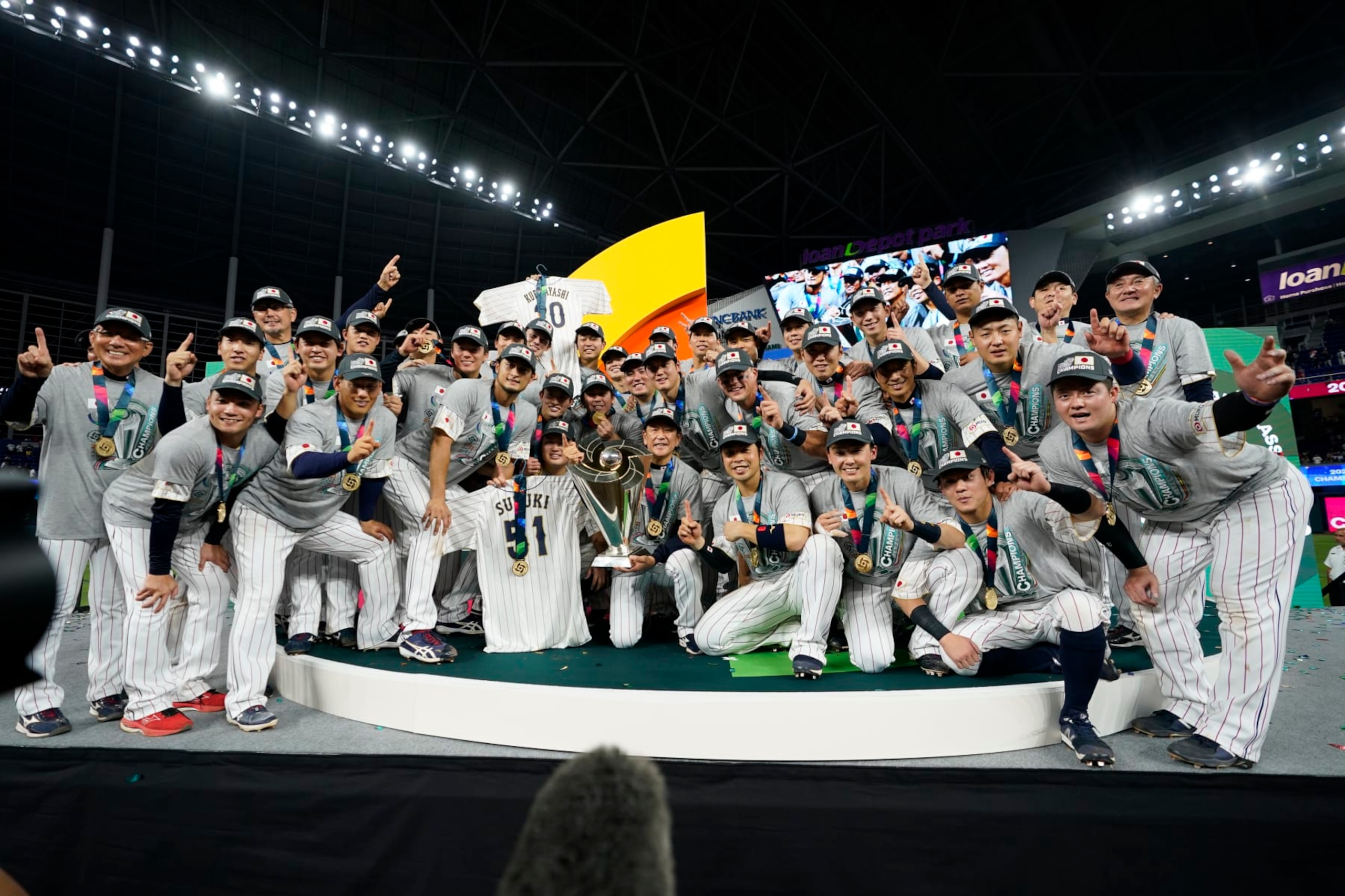 Japan players celebrate after defeating the United States in the World Baseball Classic championship game, Tuesday, March 21, 2023, in Miami. (AP Photo/Wilfredo Lee)