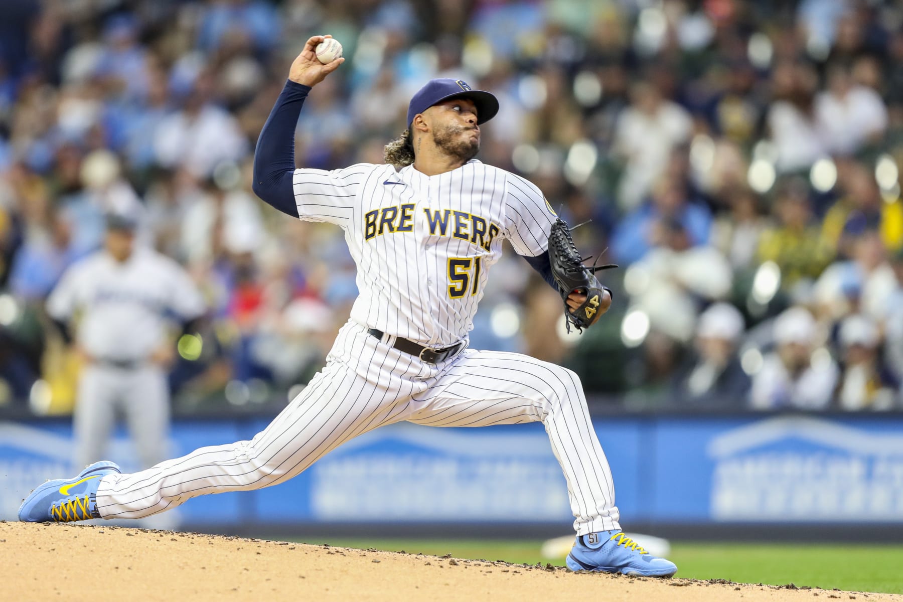 MILWAUKEE, WI - OCTOBER 02: Milwaukee Brewers starting pitcher Freddy Peralta (51) throws a pitch during a game between the Milwaukee Brewers and the Miami Marlins on October 2, 2022 at American Family Field in Milwaukee, WI. (Photo by Lawrence Iles/Icon Sportswire via Getty Images)