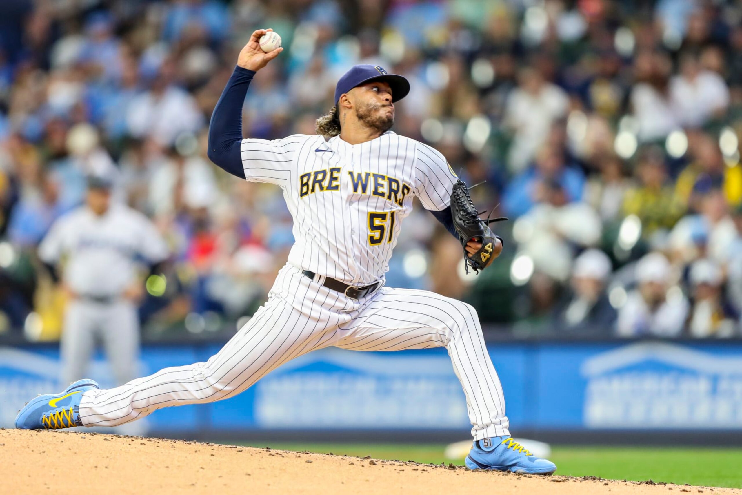 MILWAUKEE, WI - OCTOBER 02: Milwaukee Brewers starting pitcher Freddy Peralta (51) throws a pitch during a game between the Milwaukee Brewers and the Miami Marlins on October 2, 2022 at American Family Field in Milwaukee, WI. (Photo by Lawrence Iles/Icon Sportswire via Getty Images)
