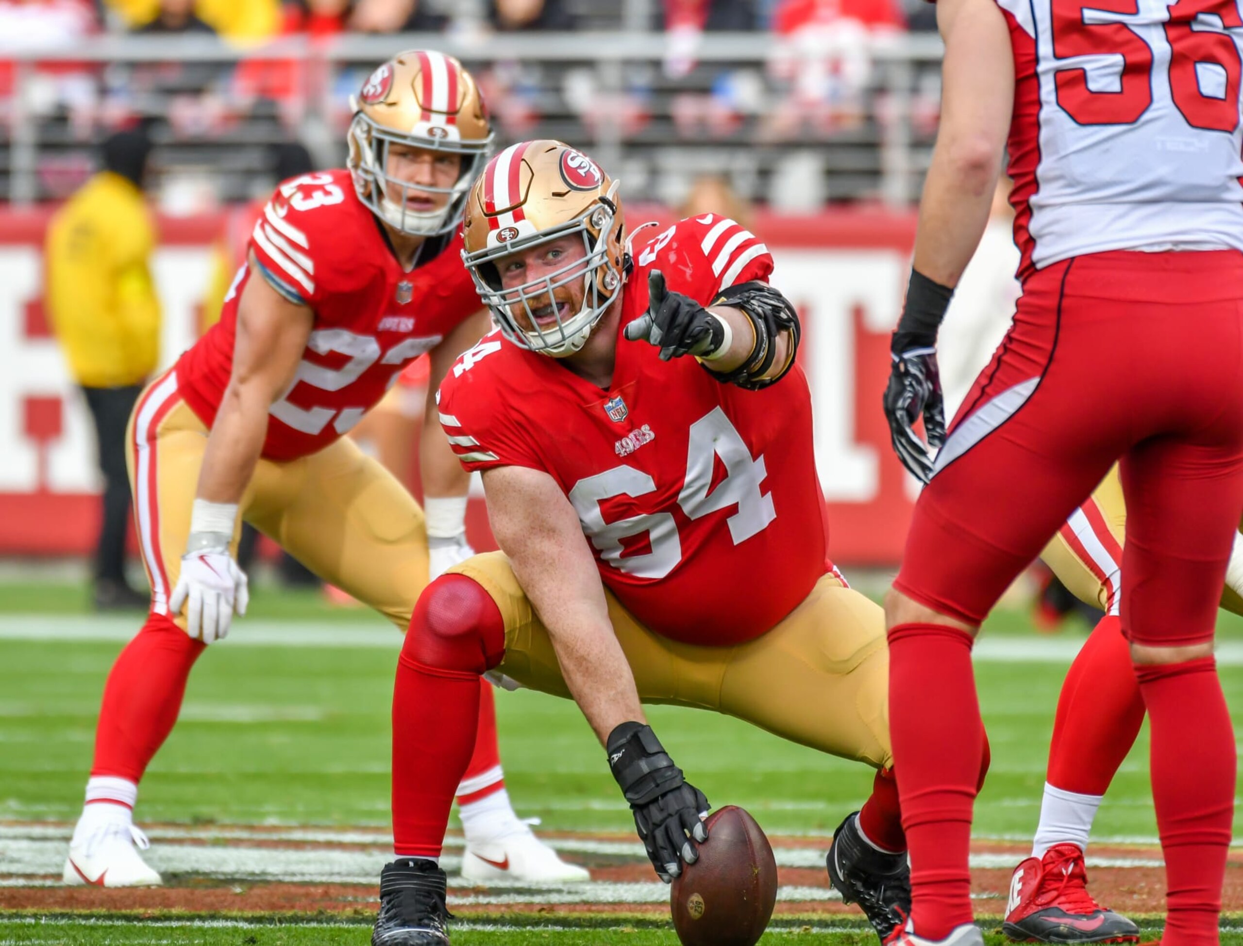 SANTA CLARA, CA - JANUARY 08: San Francisco 49ers center Jake Brendel (64) points out a shift in the line before the snap during the Week 18 game between the Arizona Cardinals and the San Francisco 49ers on Sunday, January 8, 2023 at Levi's Stadium in Santa Clara, California. (Photo by Douglas Stringer/Icon Sportswire via Getty Images)
