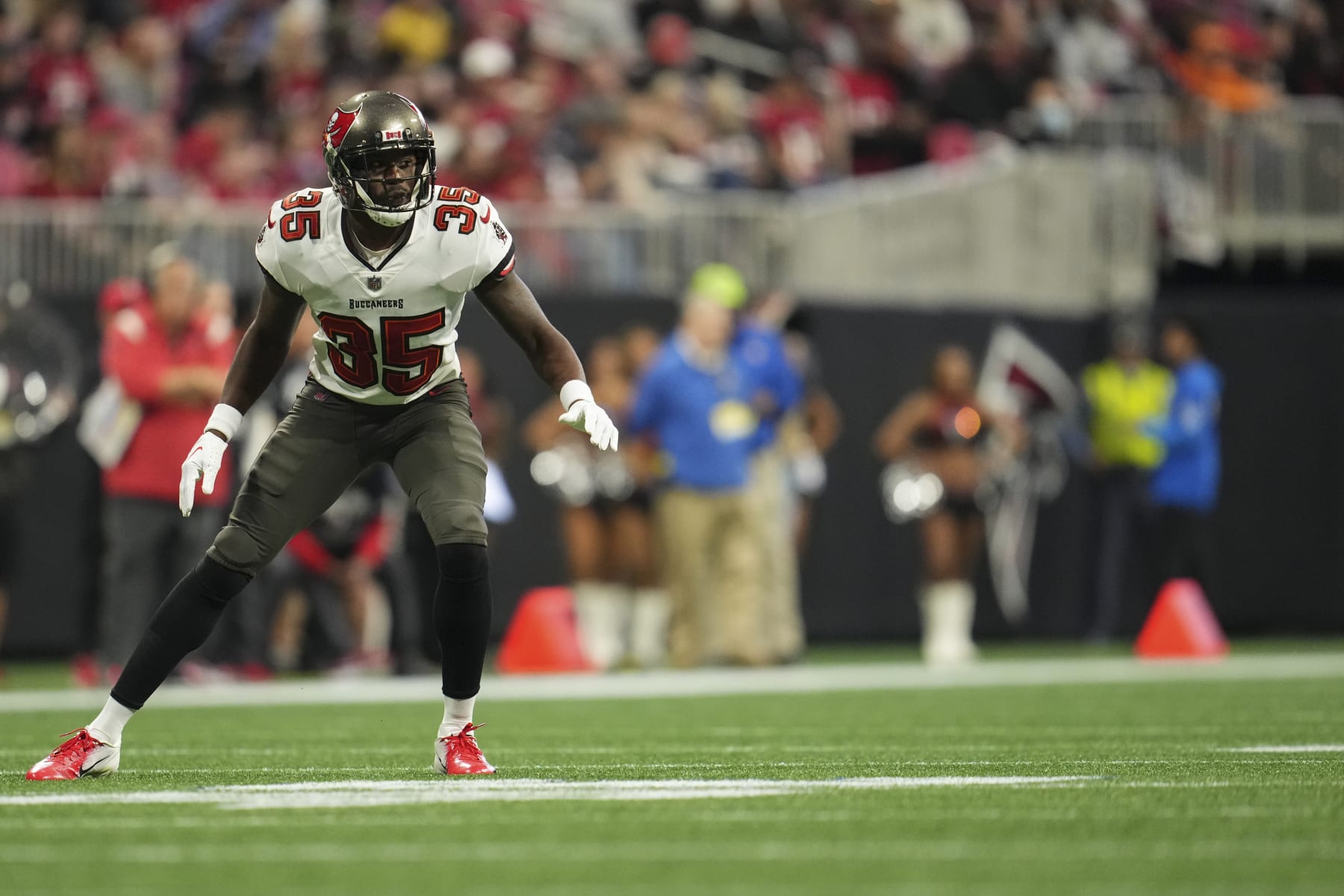 ATLANTA, GA - JANUARY 08: Jamel Dean #35 of the Tampa Bay Buccaneers defends against the Atlanta Falcons at Mercedes-Benz Stadium on January 8, 2023 in Atlanta, Georgia. (Photo by Cooper Neill/Getty Images)