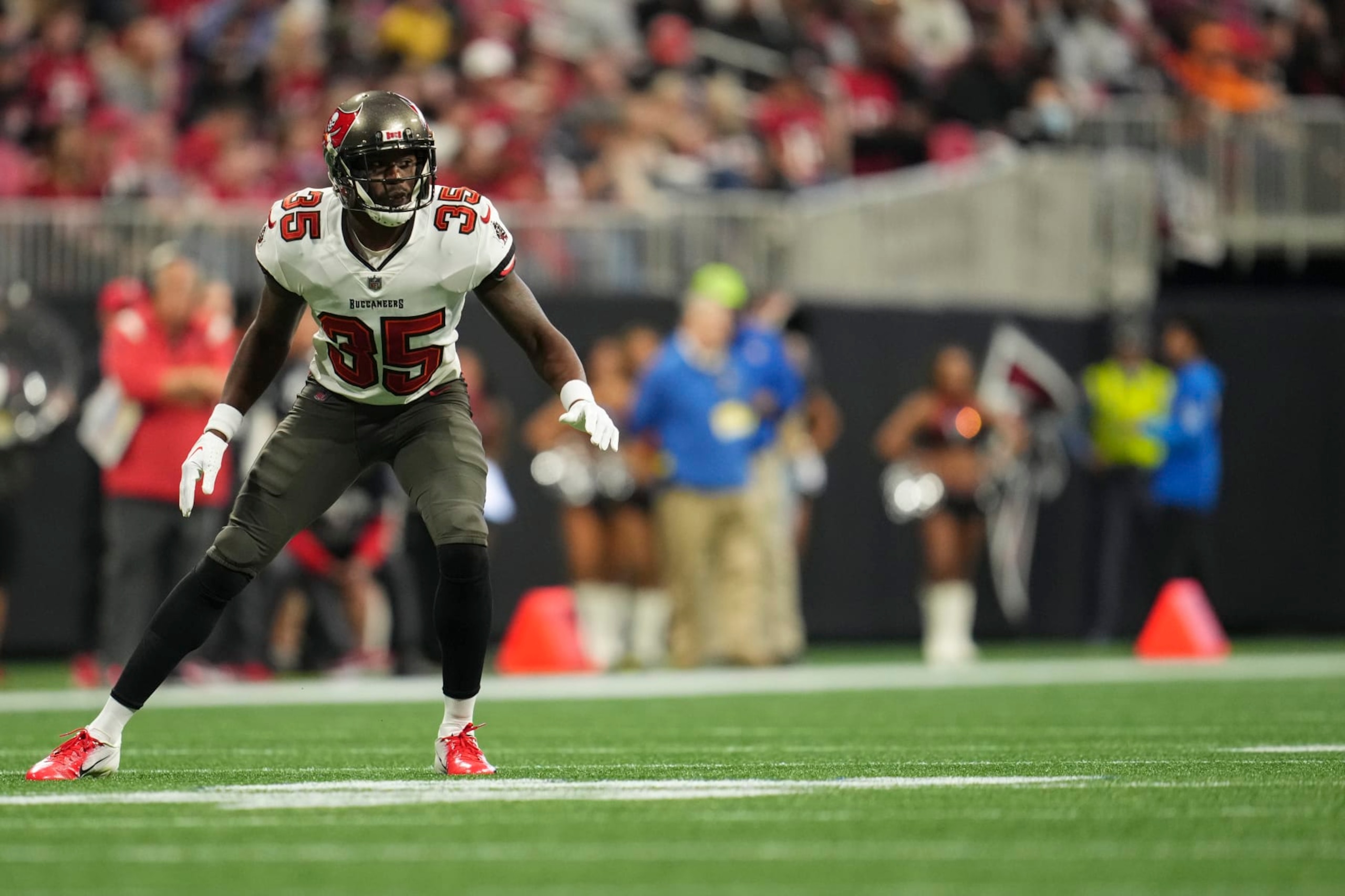 ATLANTA, GA - JANUARY 08: Jamel Dean #35 of the Tampa Bay Buccaneers defends against the Atlanta Falcons at Mercedes-Benz Stadium on January 8, 2023 in Atlanta, Georgia. (Photo by Cooper Neill/Getty Images)