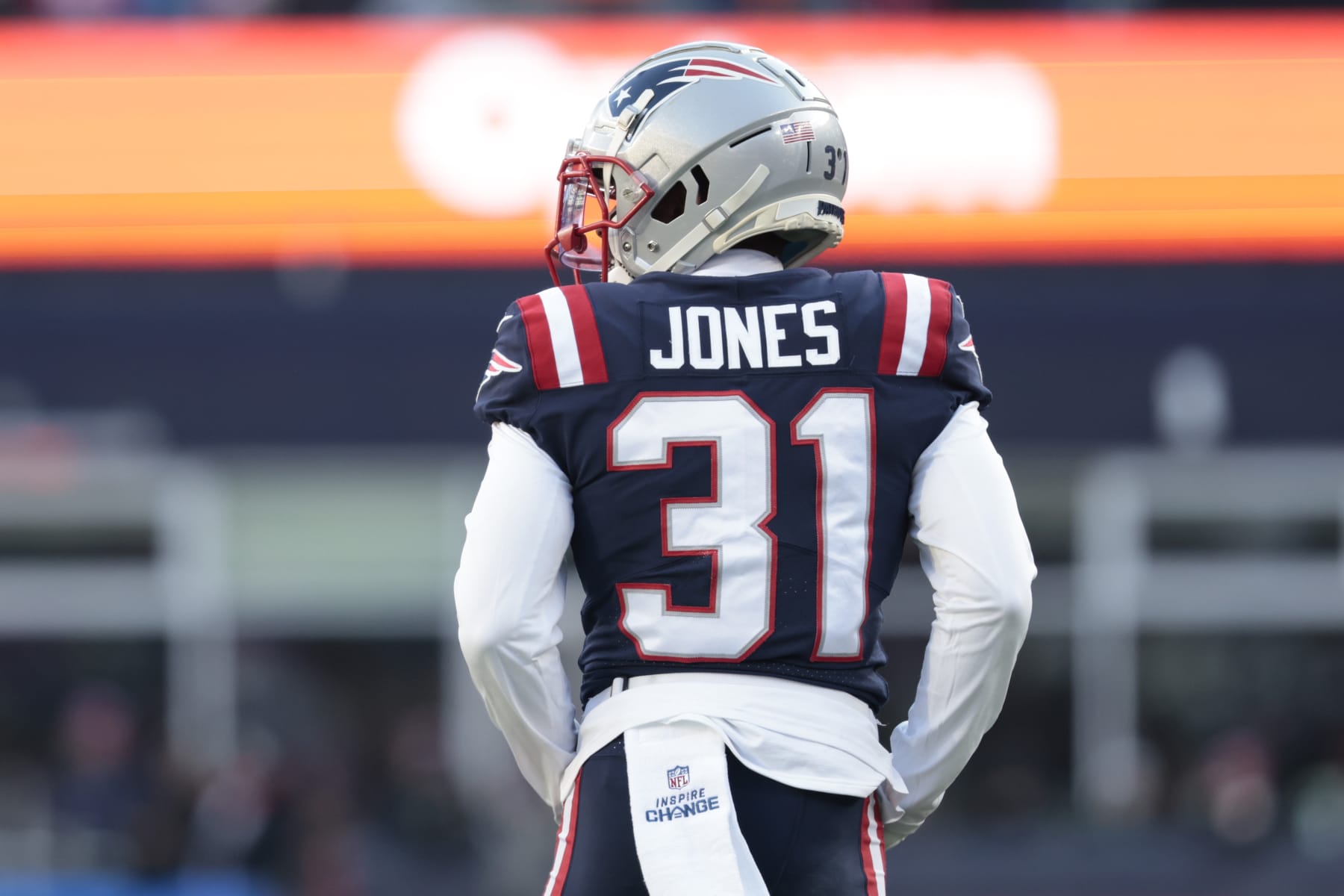 FOXBOROUGH, MASSACHUSETTS - DECEMBER 24: Jonathan Jones #31 of the New England Patriots looks on during the third quarter against the Cincinnati Bengals at Gillette Stadium on December 24, 2022 in Foxborough, Massachusetts. (Photo by Nick Grace/Getty Images)
