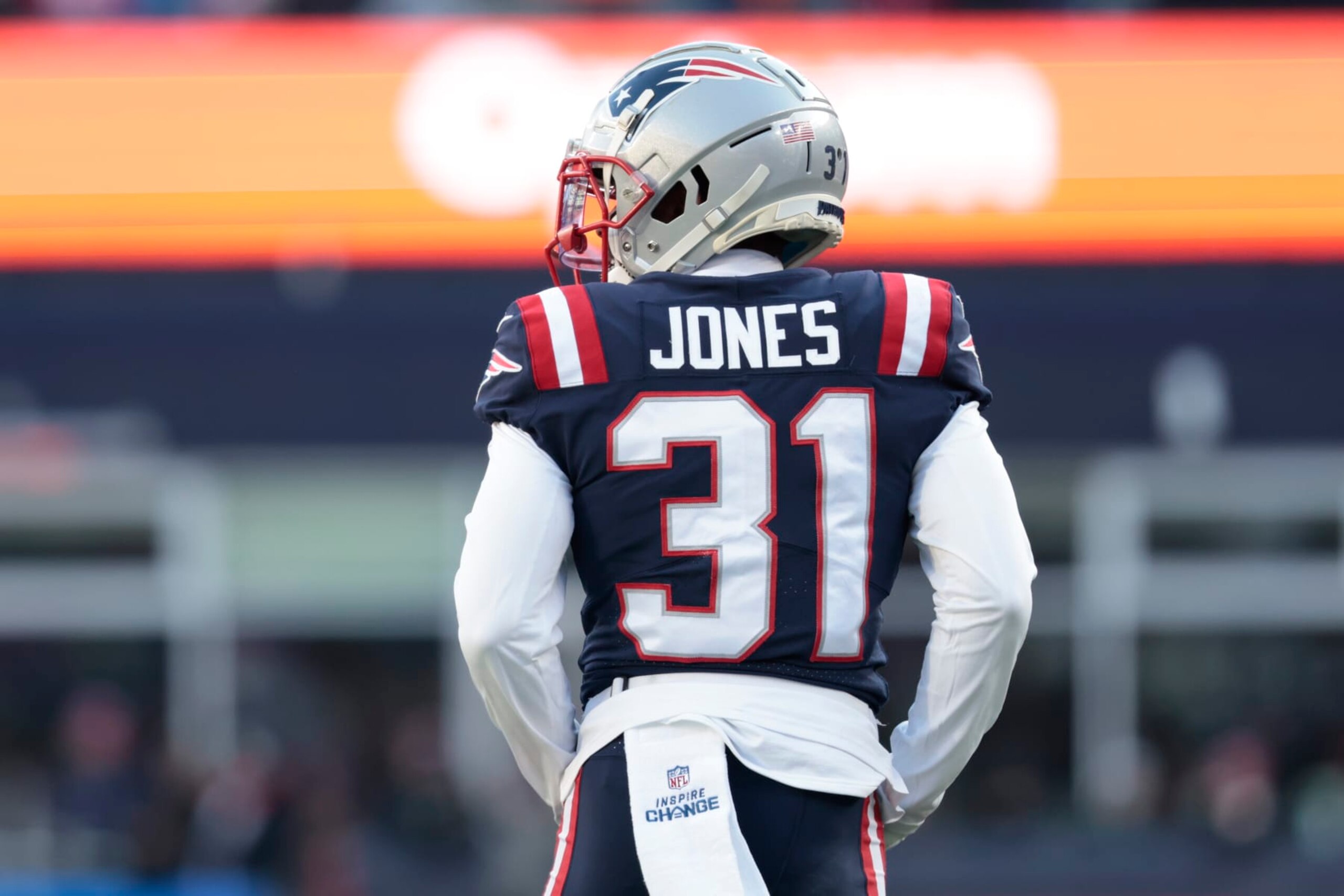 FOXBOROUGH, MASSACHUSETTS - DECEMBER 24: Jonathan Jones #31 of the New England Patriots looks on during the third quarter against the Cincinnati Bengals at Gillette Stadium on December 24, 2022 in Foxborough, Massachusetts. (Photo by Nick Grace/Getty Images)