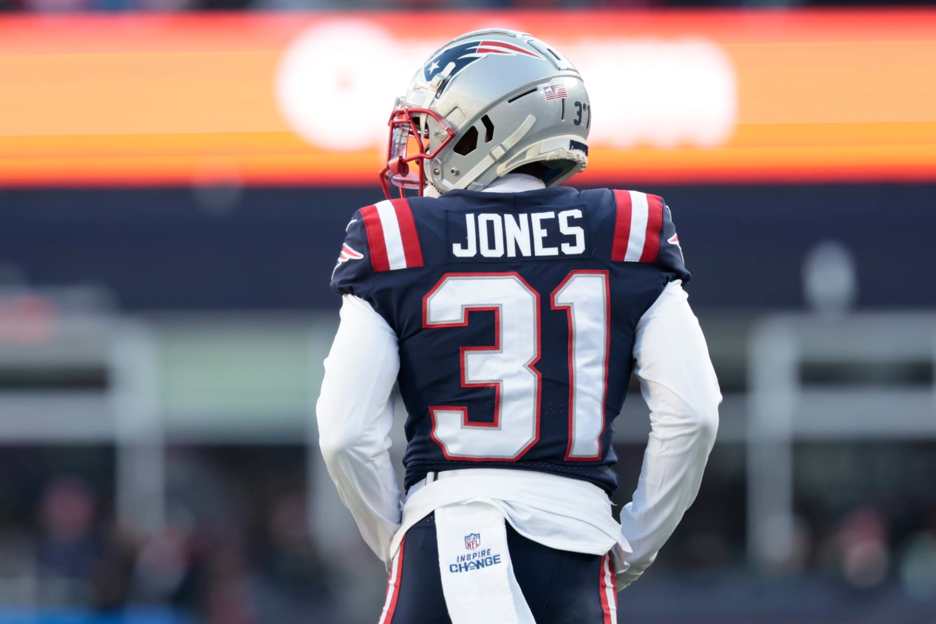 FOXBOROUGH, MASSACHUSETTS - DECEMBER 24: Jonathan Jones #31 of the New England Patriots looks on during the third quarter against the Cincinnati Bengals at Gillette Stadium on December 24, 2022 in Foxborough, Massachusetts. (Photo by Nick Grace/Getty Images)