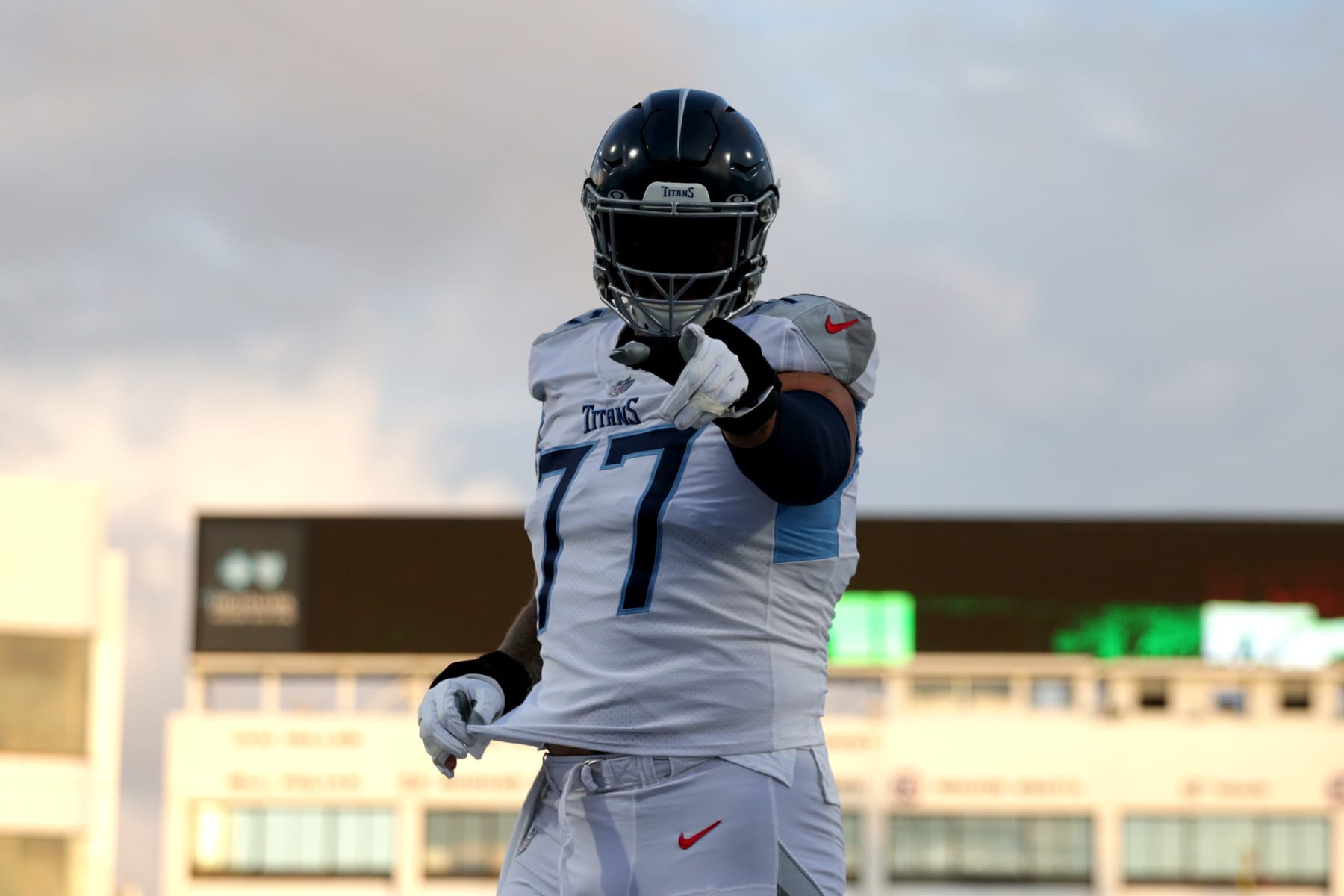 ORCHARD PARK, NEW YORK - SEPTEMBER 19: Taylor Lewan #77 of the Tennessee Titans points on the filed prior to the game against the Buffalo Bills at Highmark Stadium on September 19, 2022 in Orchard Park, New York. (Photo by Joshua Bessex/Getty Images)