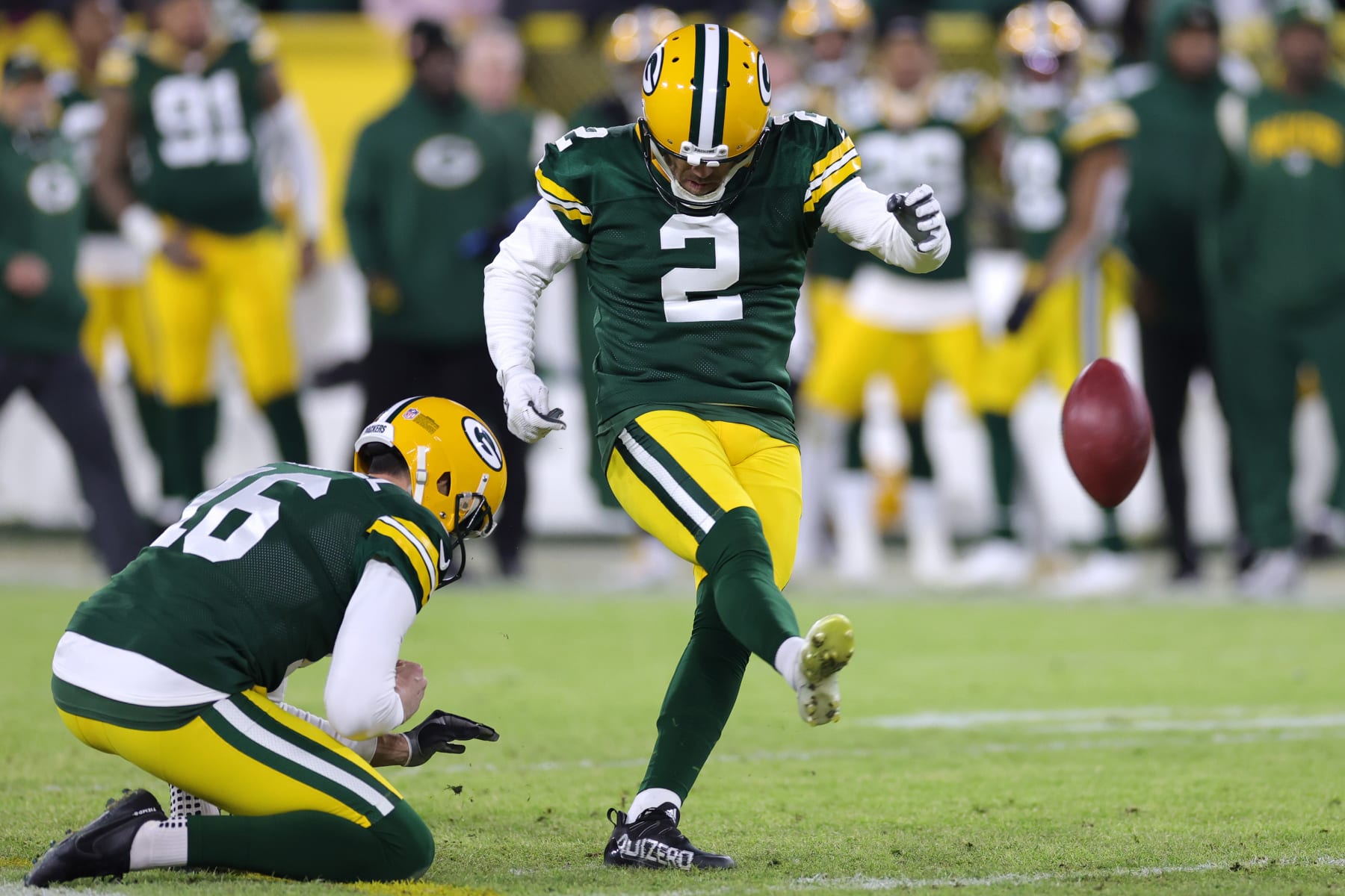 GREEN BAY, WISCONSIN - JANUARY 01: Mason Crosby #2 of the Green Bay Packers kicks a field goal during the second quarter against the Minnesota Vikings at Lambeau Field on January 01, 2023 in Green Bay, Wisconsin. (Photo by Stacy Revere/Getty Images)