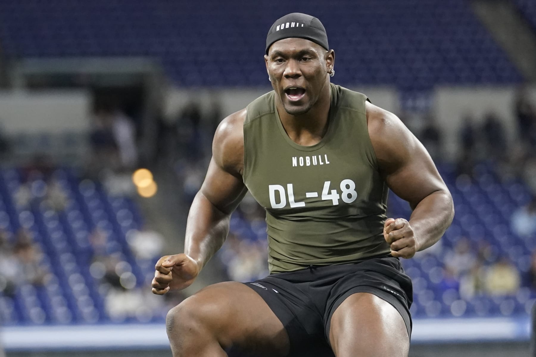 Georgia Tech defensive lineman Keion White runs a drill at the NFL football scouting combine in Indianapolis, Thursday, March 2, 2023. (AP Photo/Michael Conroy)