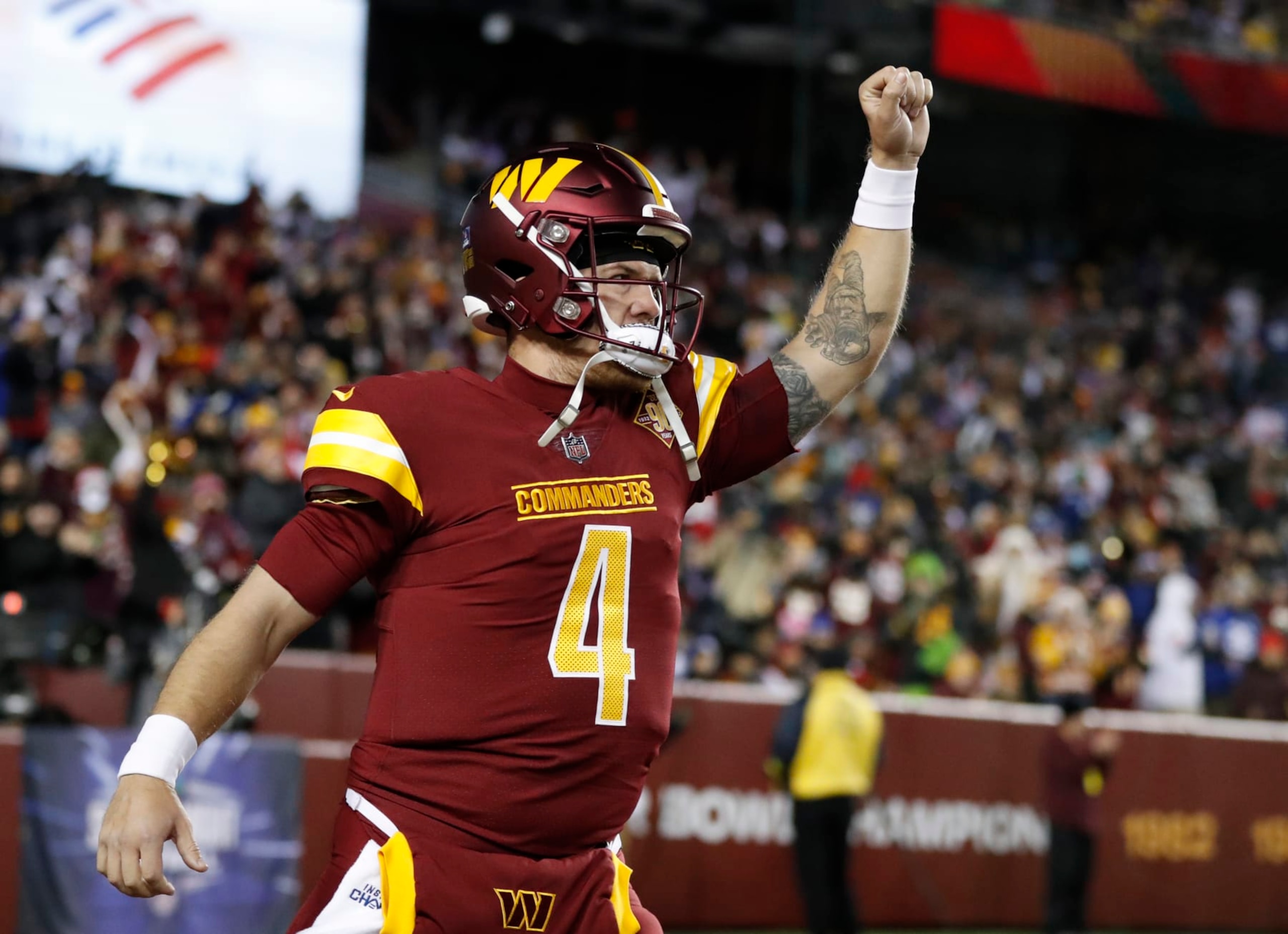 LANDOVER, MARYLAND - DECEMBER 18: Taylor Heinicke #4 of the Washington Commanders takes to the field ahead of the game against the New York Giants the New York Giants at FedExField on December 18, 2022 in Landover, Maryland. (Photo by Todd Olszewski/Getty Images)