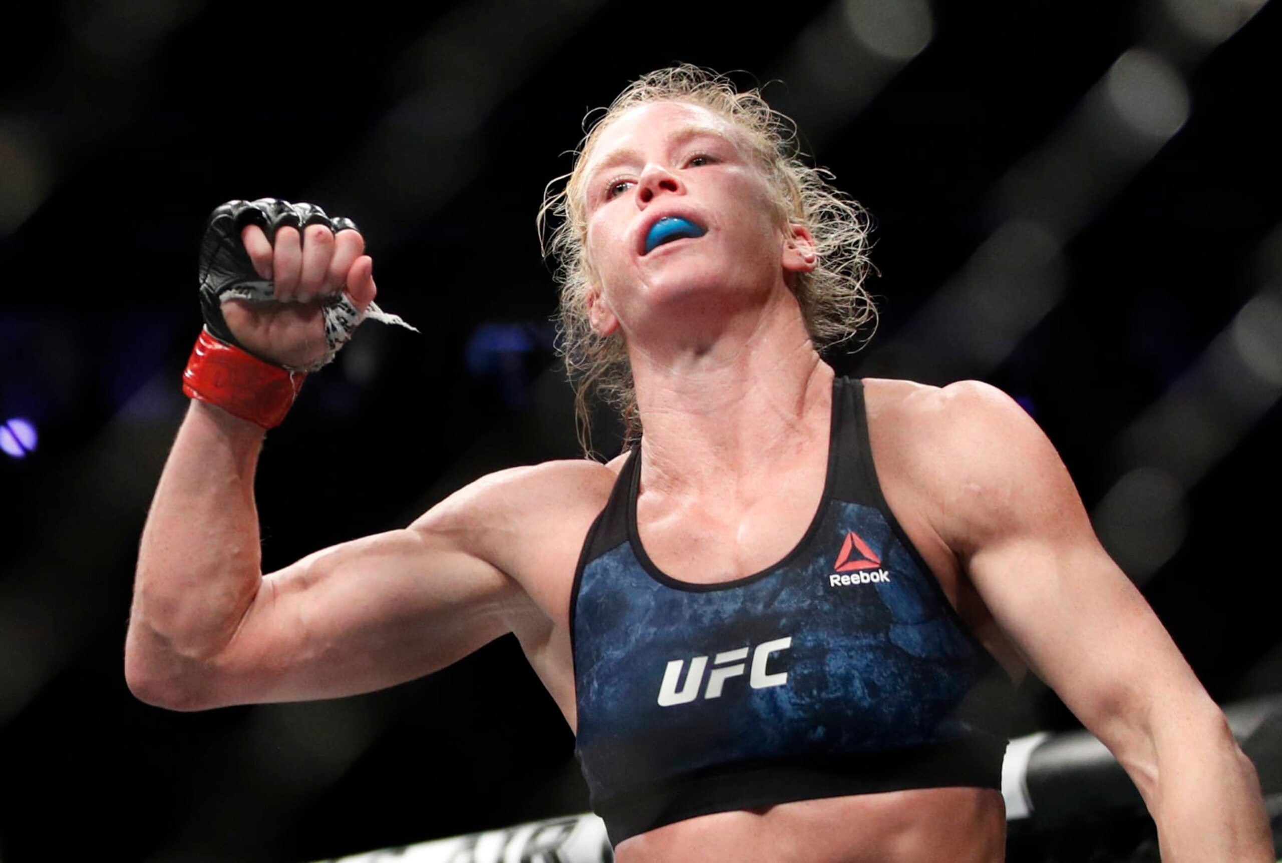 Holly Holm celebrates after defeating Raquel Pennington during a UFC 246 women's bantamweight mixed martial arts bout Saturday, Jan. 18, 2020, in Las Vegas. (AP Photo/John Locher)