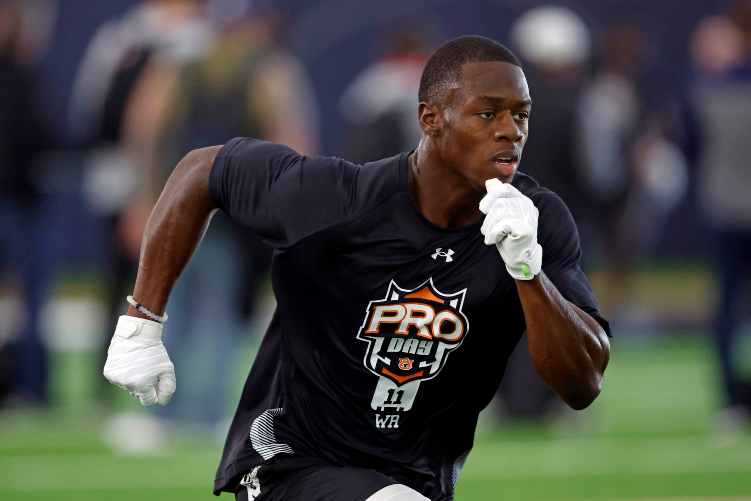 Auburn receiver Shedrick Jackson runs a route during Auburn Pro Day, Tuesday, March 21, 2023, in Auburn, Ala. (AP Photo/Butch Dill)