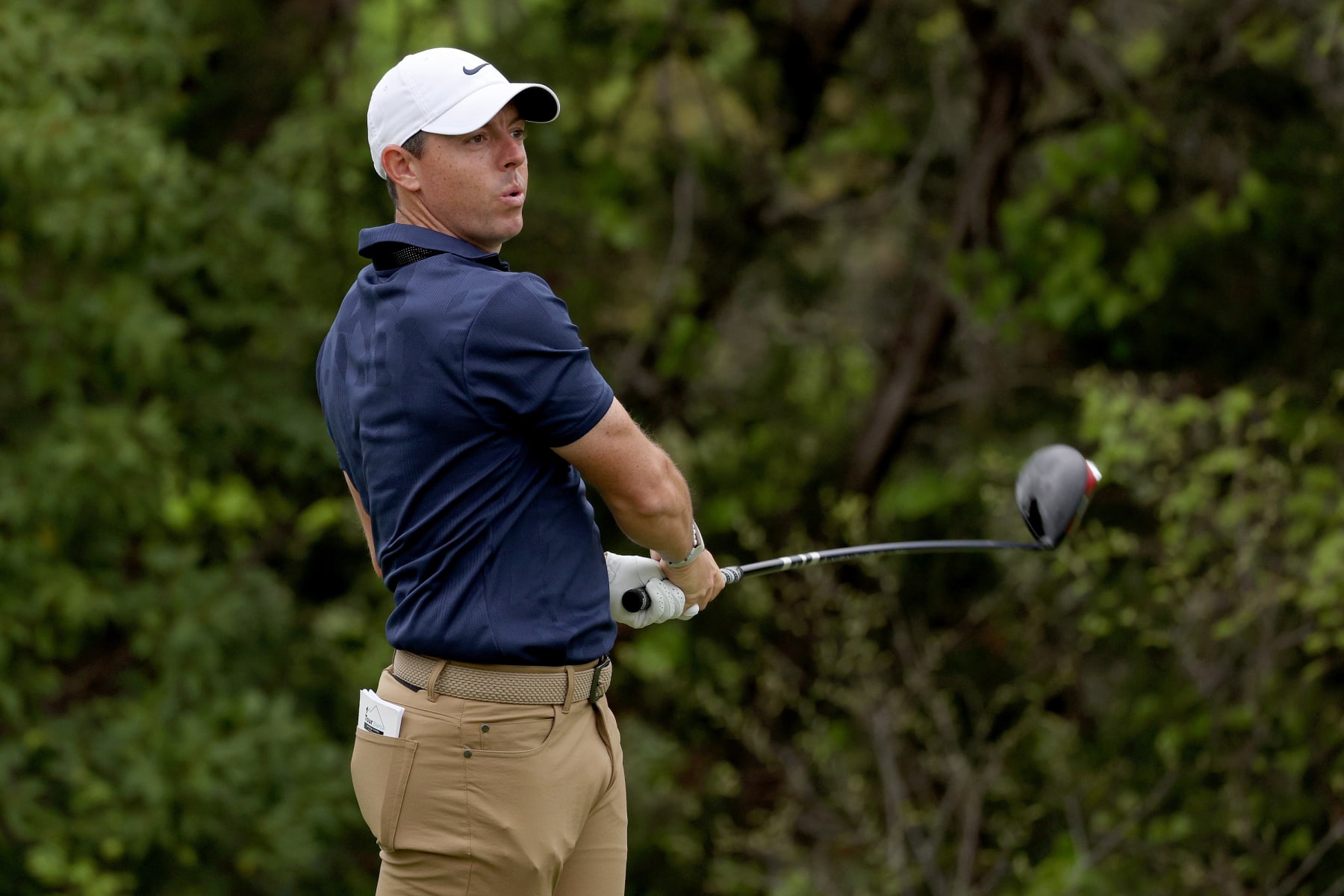 AUSTIN, TEXAS - MARCH 22: Rory McIlroy of Northern Ireland follows his shot from the second tee during day one of the World Golf Championships-Dell Technologies Match Play at Austin Country Club on March 22, 2023 in Austin, Texas. (Photo by Harry How/Getty Images)