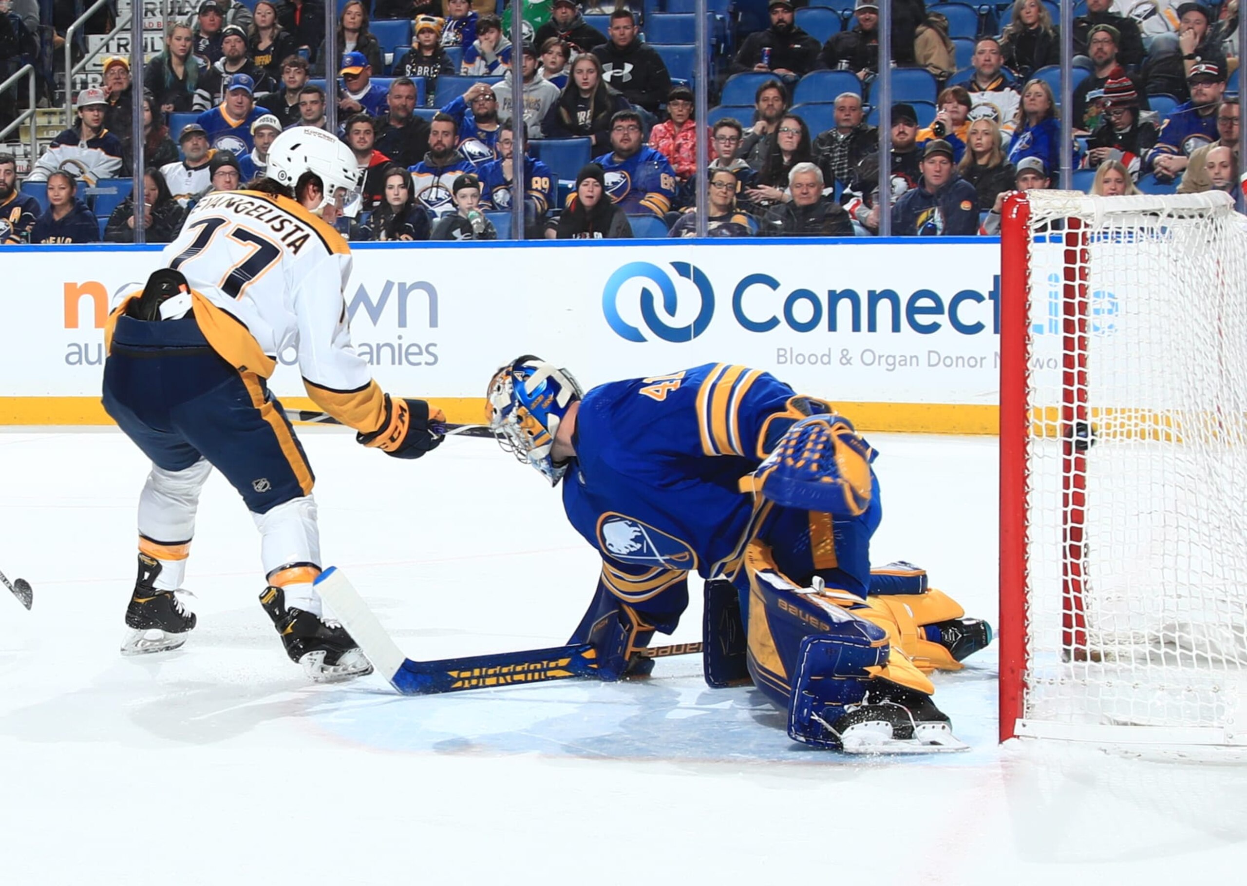 BUFFALO, NY - MARCH 21: Luke Evangelista #77 of the Nashville Predators scores his second of two second period goals against Craig Anderson #41 of the Buffalo Sabres during an NHL game on March 21, 2023 at KeyBank Center in Buffalo, New York. (Photo by Bill Wippert/NHLI via Getty Images)