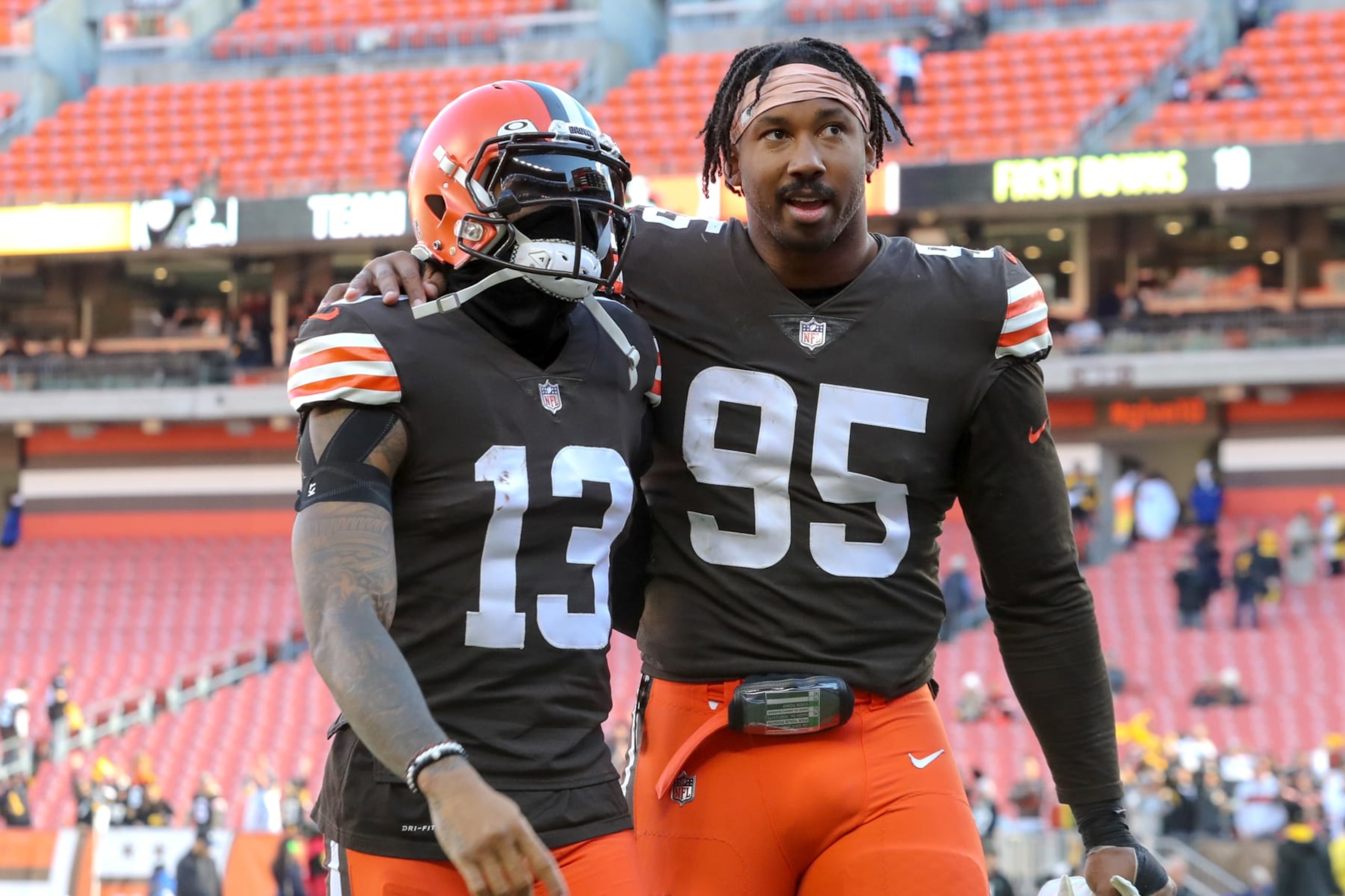 CLEVELAND, OH - OCTOBER 31: Cleveland Browns wide receiver Odell Beckham (13) and Cleveland Browns defensive end Myles Garrett (95) leave the field following the National Football League game between the Pittsburgh Steelers and Cleveland Browns on October 31, 2021, at FirstEnergy Stadium in Cleveland, OH. (Photo by Frank Jansky/Icon Sportswire via Getty Images)