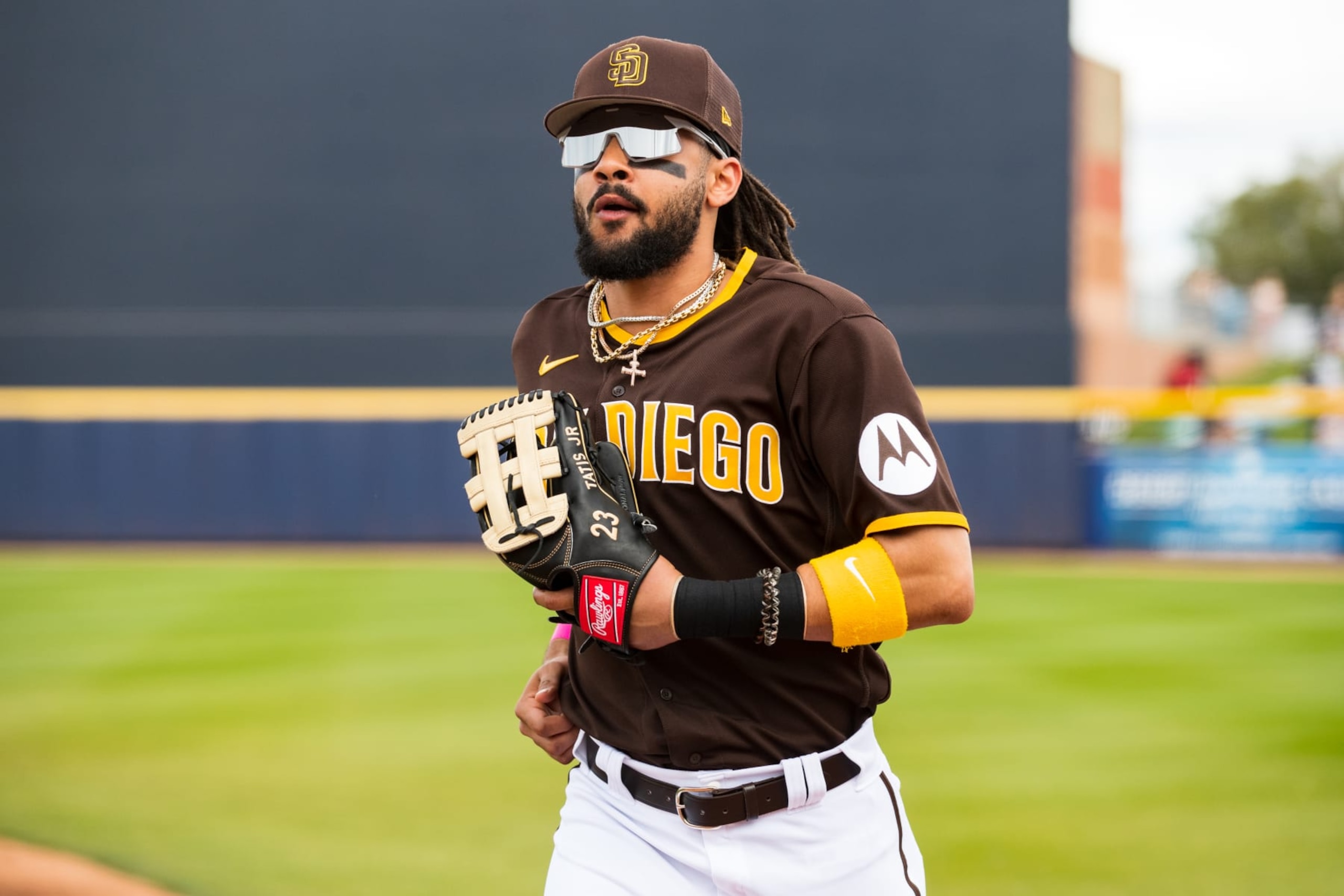 PEORIA, ARIZONA - MARCH 11: Fernando Tatis Jr. #23 of the San Diego Padres runs to the dugout during the Spring Training Game against the Chicago White Sox at Peoria Stadium on March 11, 2023 in Peoria, Arizona. (Photo by John E. Moore III/Getty Images)