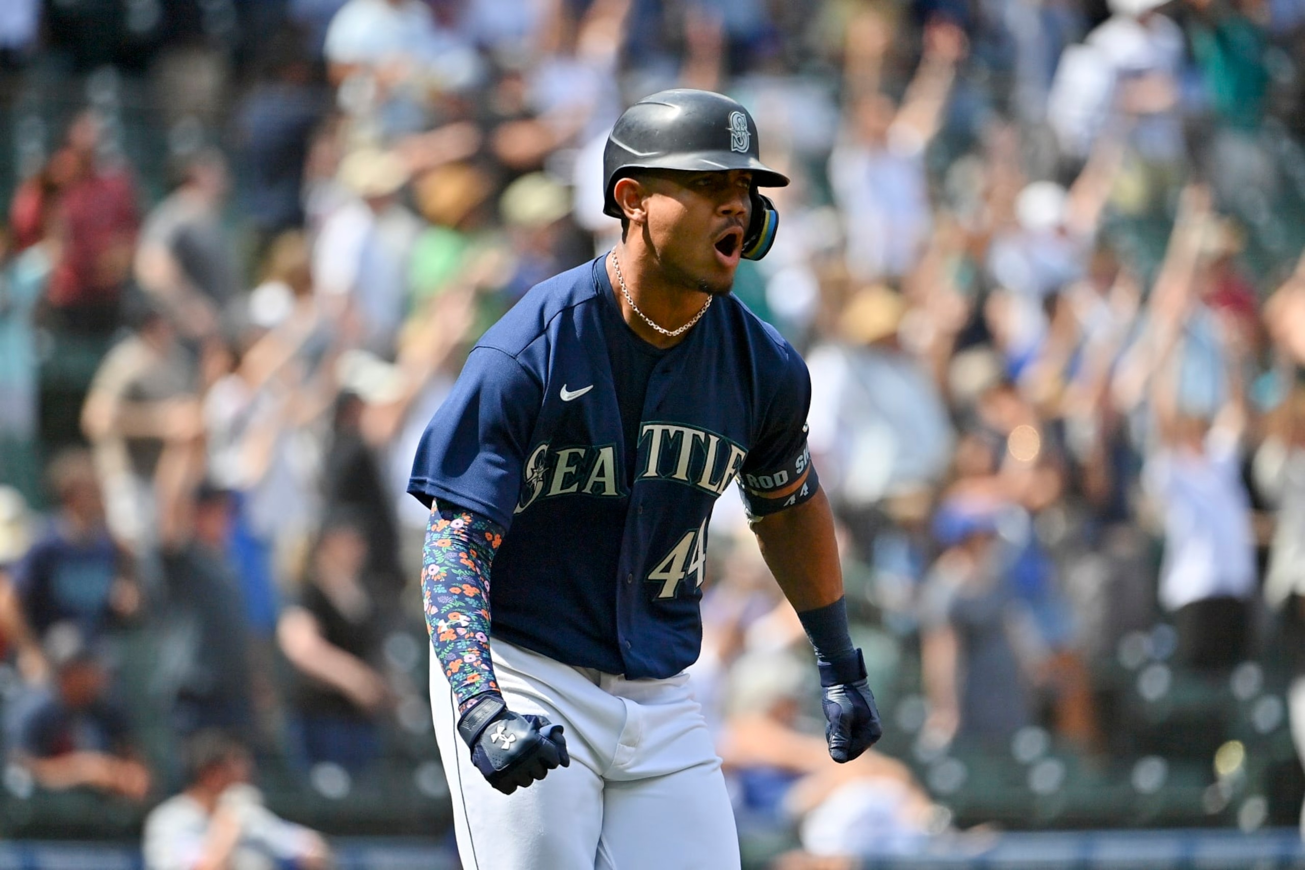 SEATTLE, WASHINGTON - JULY 27: Julio Rodriguez #44 of the Seattle Mariners reacts after hitting a three run home run during the seventh inning against the Texas Rangers at T-Mobile Park on July 27, 2022 in Seattle, Washington. (Photo by Alika Jenner/Getty Images)