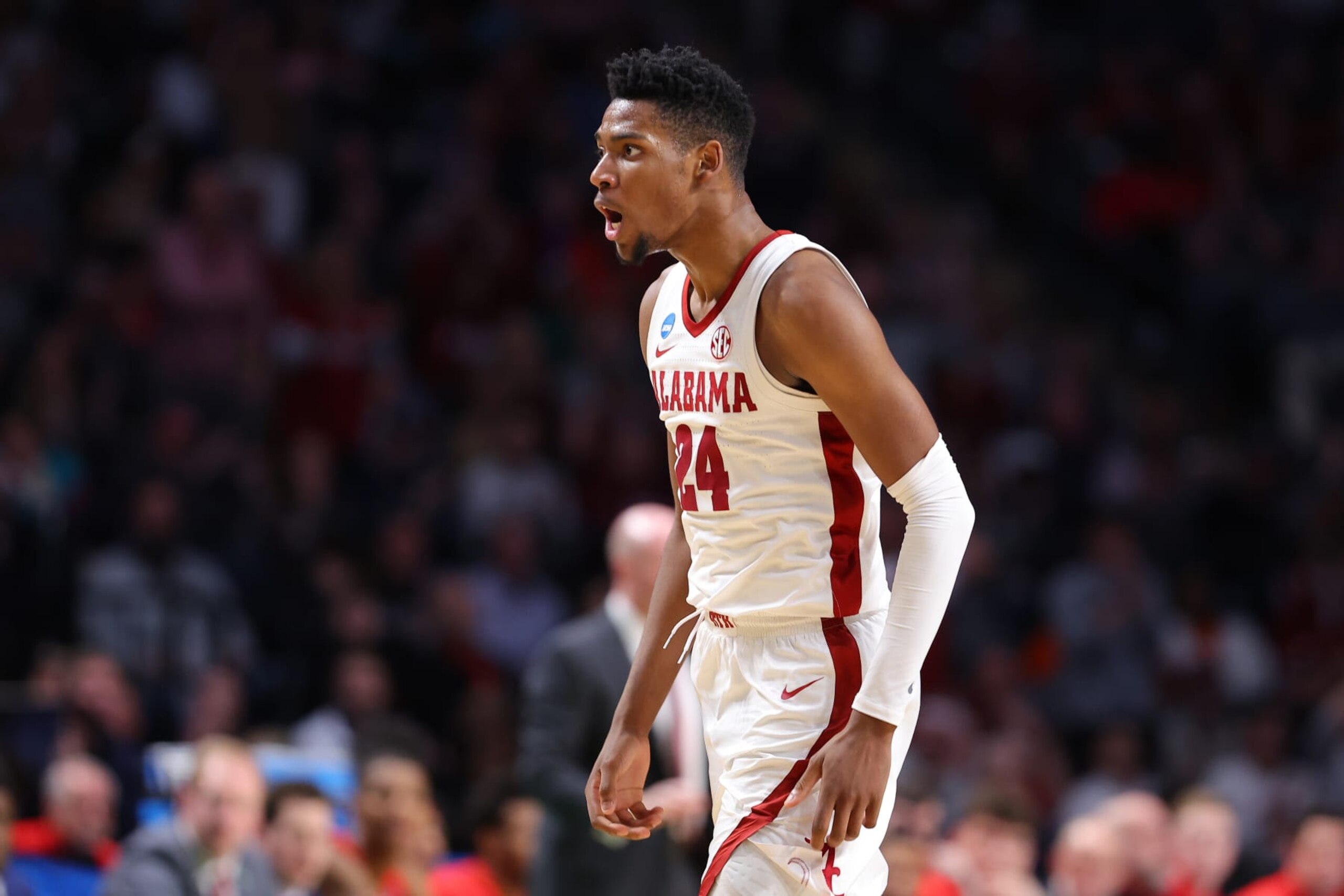 BIRMINGHAM, ALABAMA - MARCH 18: Brandon Miller #24 of the Alabama Crimson Tide reacts during the first half against the Maryland Terrapins in the second round of the NCAA Men's Basketball Tournament at Legacy Arena at the BJCC on March 18, 2023 in Birmingham, Alabama. (Photo by Kevin C. Cox/Getty Images)