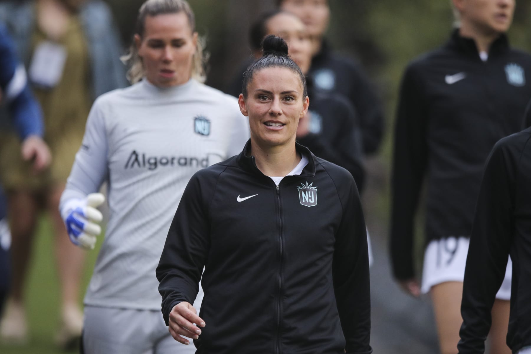 SAN DIEGO, CALIFORNIA - MAY 07: Ali Krieger #11 of NJ/NY Gotham FC walks down to the stadium for the game ;S at Torero Stadium on May 07, 2022 in San Diego, California. (Photo by Meg Oliphant/Getty Images)