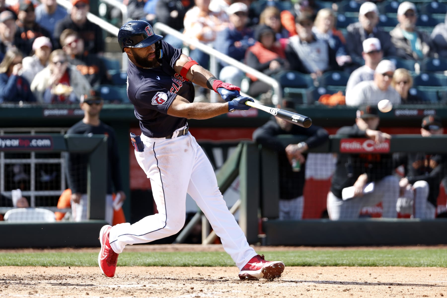 GOODYEAR, ARIZONA - MARCH 02: Amed Rosario #1 of the Cleveland Guardians hits a grounder during the fifth inning of a spring training game against the San Francisco Giants at Goodyear Ballpark on March 02, 2023 in Goodyear, Arizona. (Photo by Chris Coduto/Getty Images)