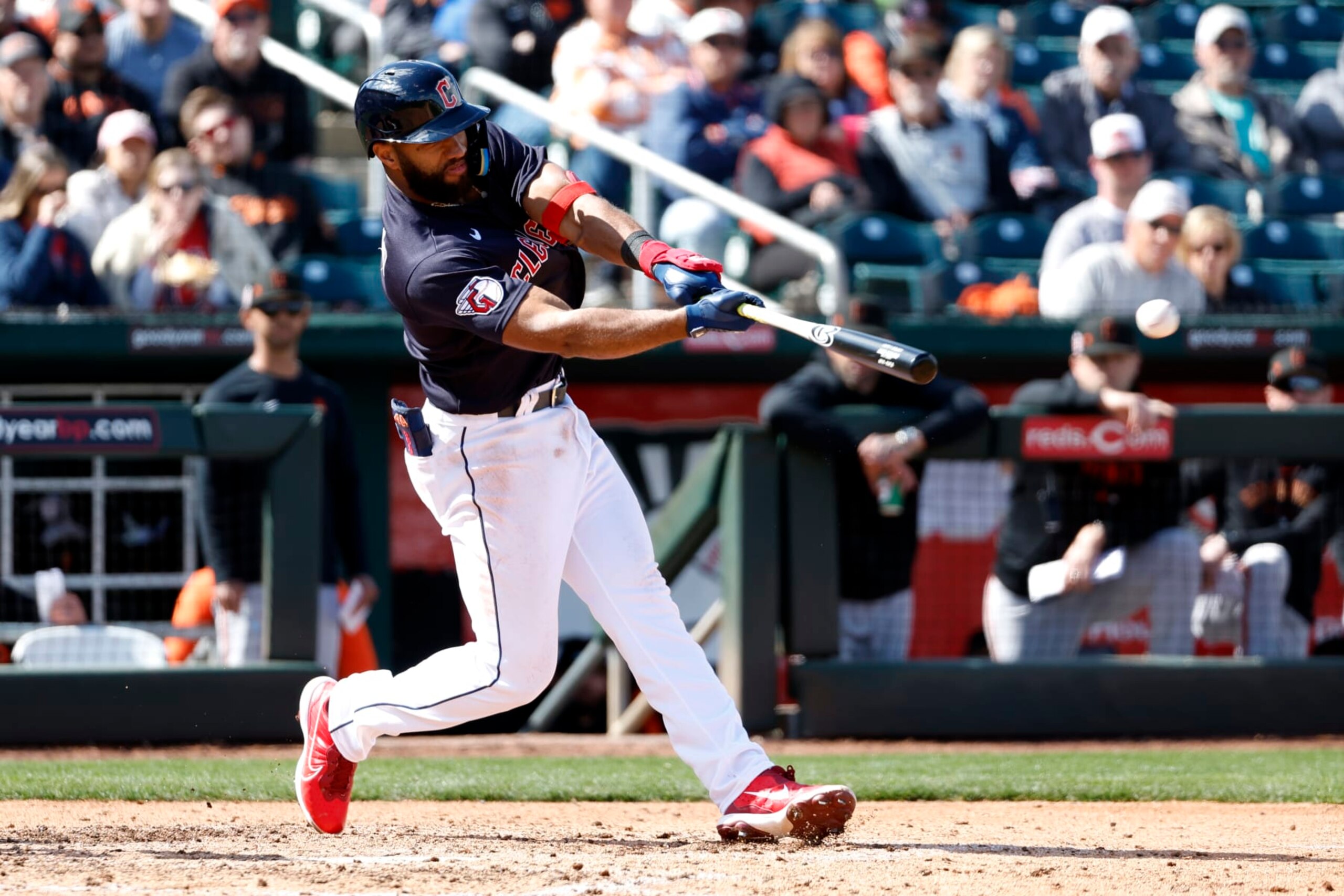 GOODYEAR, ARIZONA - MARCH 02: Amed Rosario #1 of the Cleveland Guardians hits a grounder during the fifth inning of a spring training game against the San Francisco Giants at Goodyear Ballpark on March 02, 2023 in Goodyear, Arizona. (Photo by Chris Coduto/Getty Images)