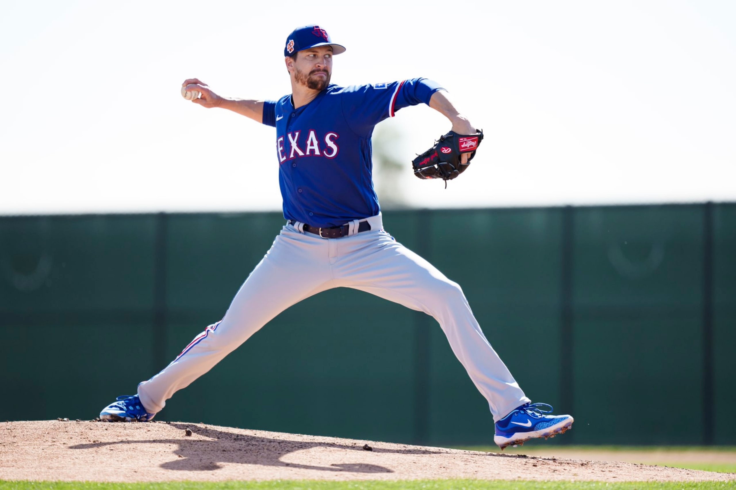 SURPRISE, AZ - MARCH 08: Jacob deGrom #48 of the Texas Rangers delivers a pitch during a spring training team workout at Surprise Stadium on March 8, 2023 in Surprise, Arizona. (Photo by Ben Ludeman/Texas Rangers/Getty Images)
