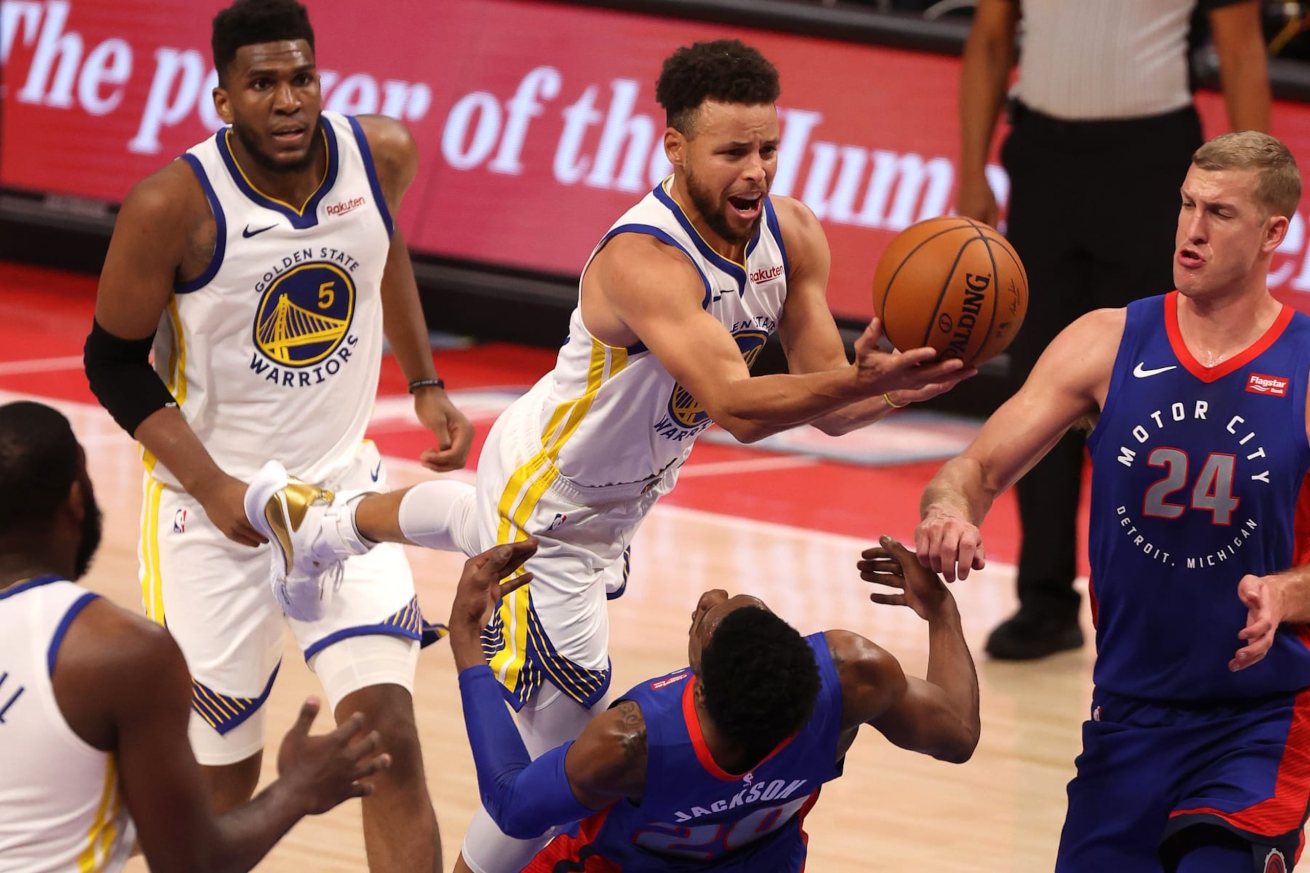 DETROIT, MICHIGAN - DECEMBER 29: Stephen Curry #30 of the Golden State Warriors tries to get to the basket past Josh Jackson #20 of the Detroit Pistons during the first half at Little Caesars Arena on December 29, 2020 in Detroit, Michigan. NOTE TO USER: User expressly acknowledges and agrees that, by downloading and or using this photograph, User is consenting to the terms and conditions of the Getty Images License Agreement. (Photo by Gregory Shamus/Getty Images)