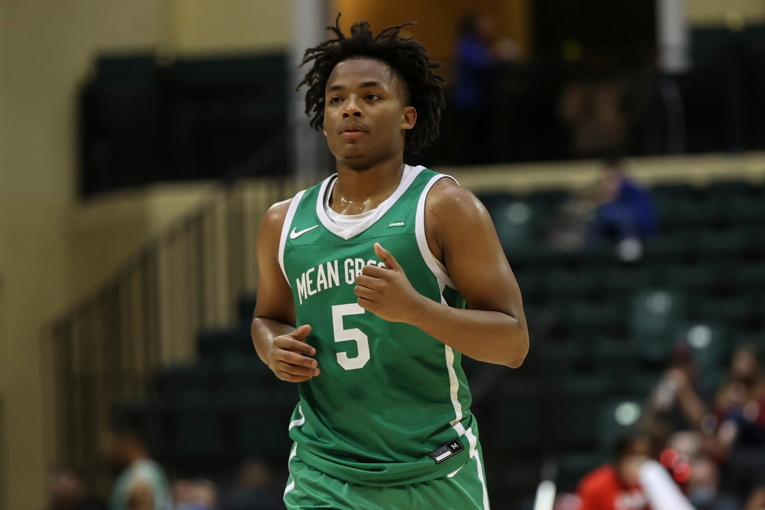 ORLANDO, FL - NOVEMBER 25: North Texas Mean Green guard Tylor Perry (5) during the ESPN Events Invitational college basketball game between the North Texas Mean Green and Kansas Jayhawks on November 25, 2021 at the HP Field House in Orlando, FL. (Photo by Mark LoMoglio/Icon Sportswire via Getty Images)