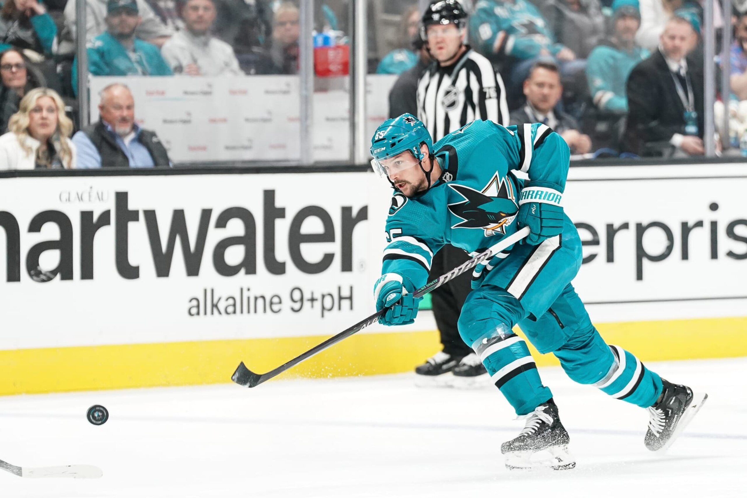SAN JOSE, CA - FEBRUARY 18: Erik Karlsson #65 of the San Jose Sharks takes a shot on goal against the Buffalo Sabres at SAP Center on February 18, 2023 in San Jose, California. (Photo by Kavin Mistry/NHLI via Getty Images)