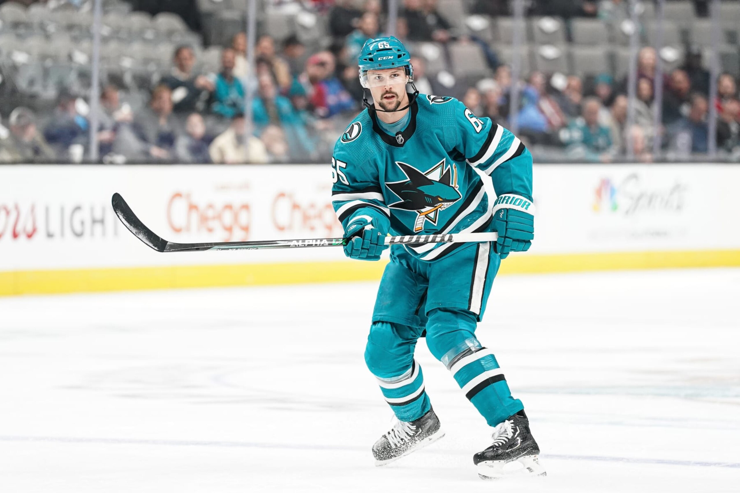 SAN JOSE, CA - FEBRUARY 28: Erik Karlsson #65 of the San Jose Sharks passes the puck against the Montreal Canadiens at SAP Center on February 28, 2023 in San Jose, California. (Photo by Kavin Mistry/NHLI via Getty Images)