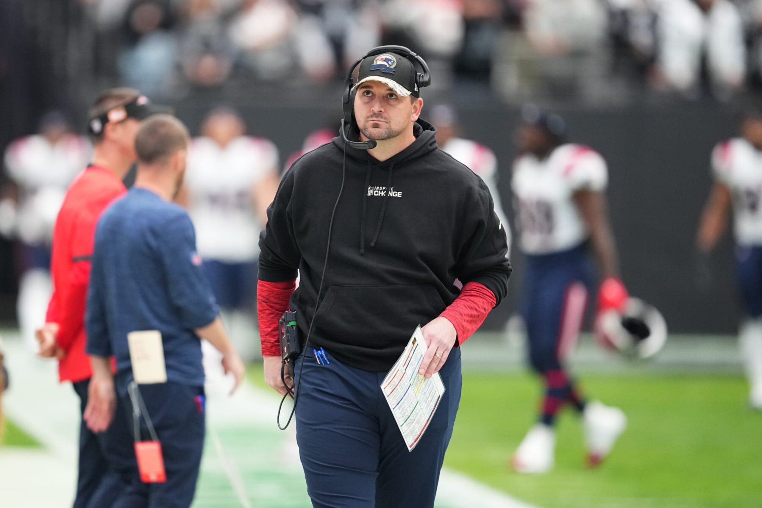 LAS VEGAS, NEVADA - DECEMBER 18:  Offensive assistant Joe Judge of the New England Patriots walks along the sideline prior to a game against the Las Vegas Raiders at Allegiant Stadium on December 18, 2022 in Las Vegas, Nevada. (Photo by Chris Unger/Getty Images)
