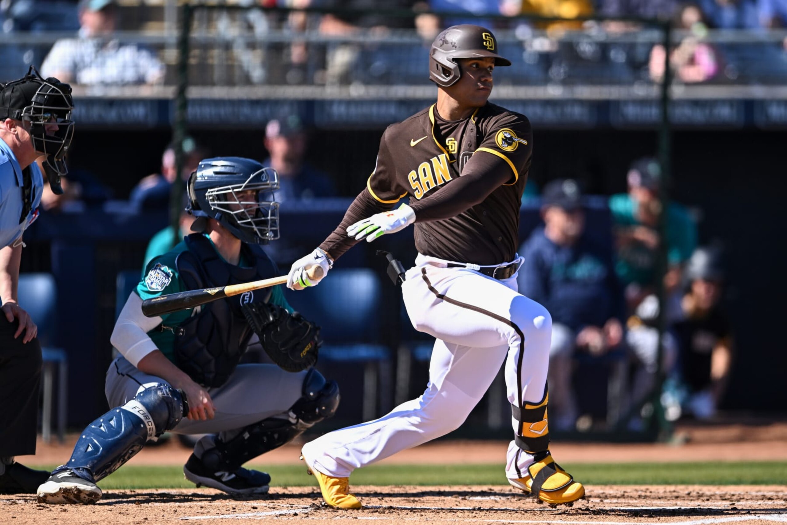 PEORIA, ARIZONA - FEBRUARY 24, 2023: Juan Soto #22 of the San Diego Padres hits a single during the first inning of a spring training game against the Seattle Mariners at Peoria Stadium on February 24, 2023 in Peoria, Arizona. (Photo by Chris Bernacchi/Diamond Images via Getty Images)
