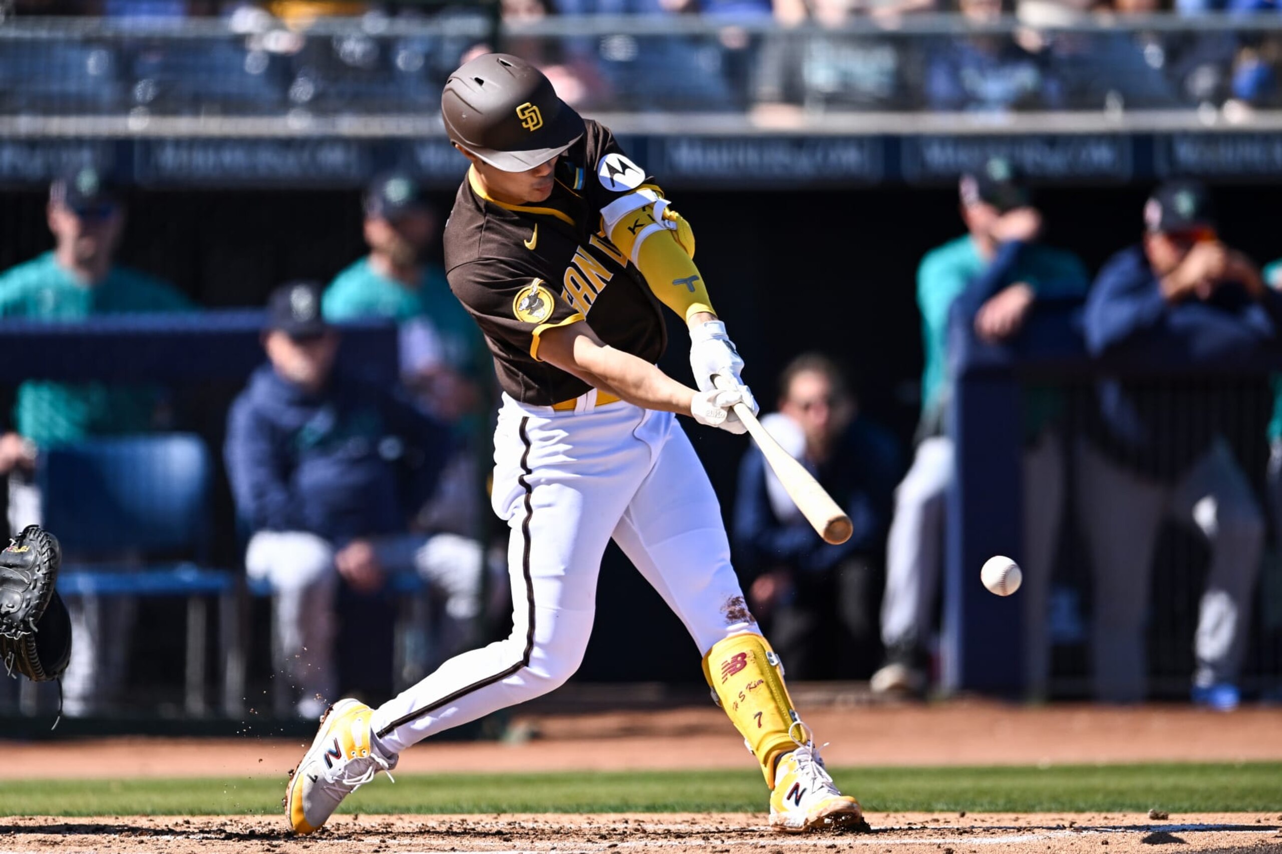 PEORIA, ARIZONA - FEBRUARY 24, 2023: Ha-Seong Kim #7 of the San Diego Padres bats during the first inning of a spring training game against the Seattle Mariners at Peoria Stadium on February 24, 2023 in Peoria, Arizona. (Photo by Chris Bernacchi/Diamond Images via Getty Images)