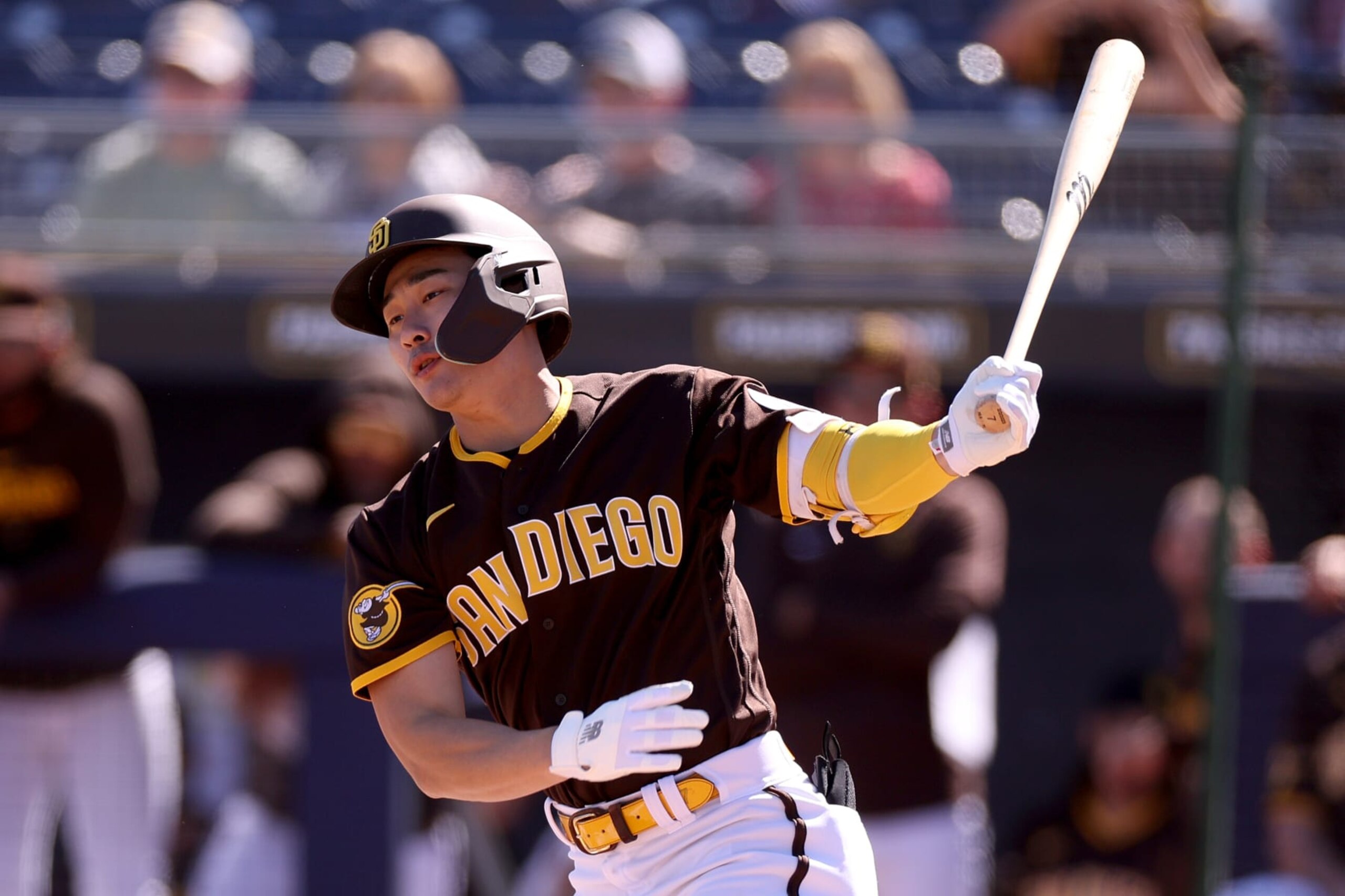 PEORIA, ARIZONA - FEBRUARY 24: Ha-Seong Kim #7 of the San Diego Padres at bat against the Seattle Mariners in a spring training game at Peoria Stadium on February 24, 2023 in Peoria, Arizona. (Photo by Steph Chambers/Getty Images)