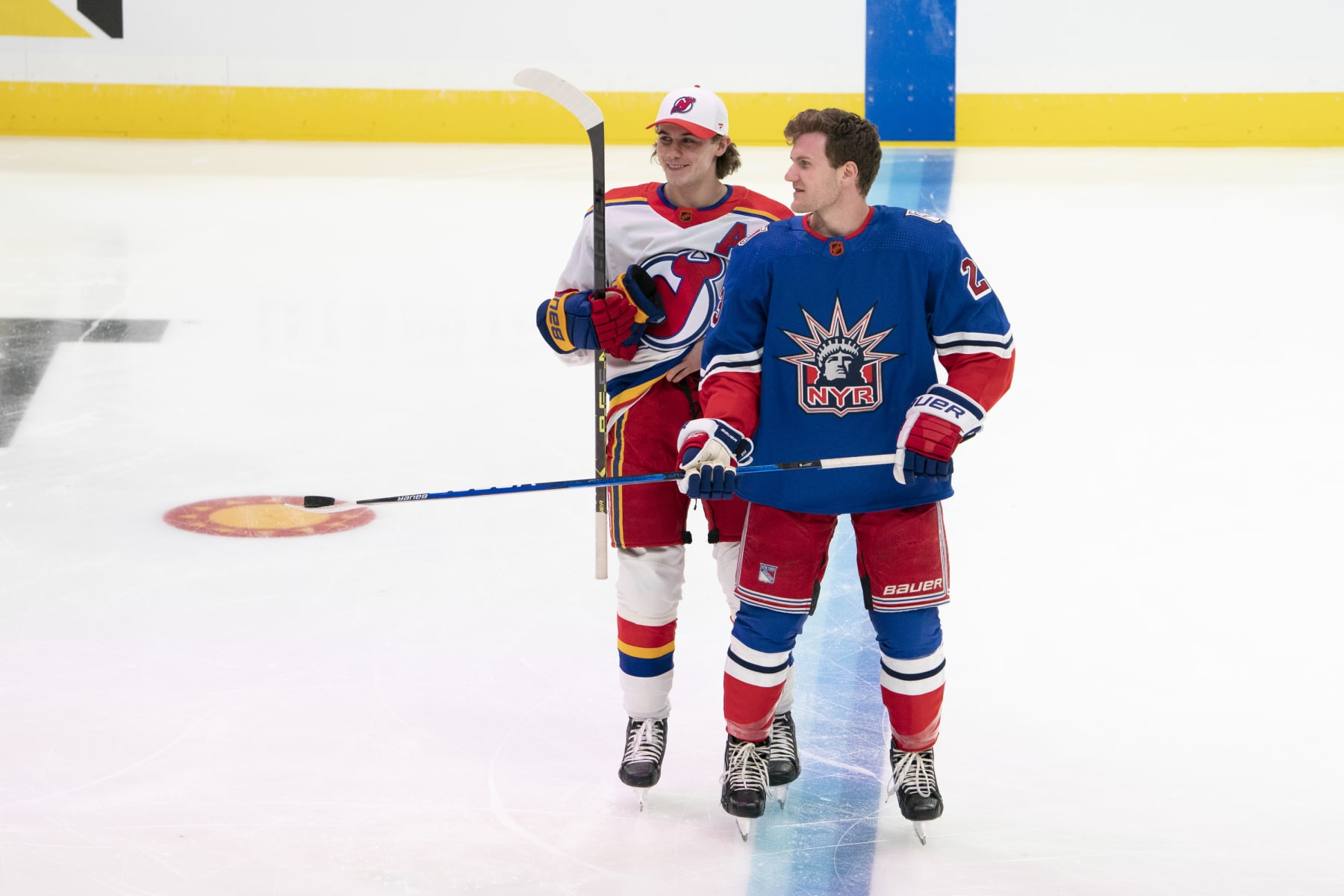 SUNRISE, FL - FEBRUARY 03: Jack Hughes #86 of the New Jersey Devils and Adam Fox #23 of the New York Ranger skate during warm-ups before the NHL All-Star Skills showcase at FLA Live Arena in Sunrise, FL on February, 2023. (Photo by Jason Mowry/Icon Sportswire via Getty Images)