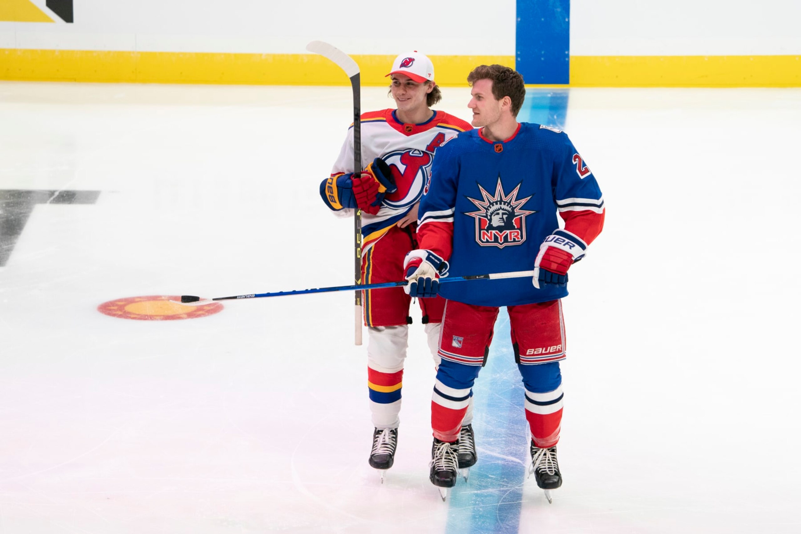 SUNRISE, FL - FEBRUARY 03: Jack Hughes #86 of the New Jersey Devils and Adam Fox #23 of the New York Ranger skate during warm-ups before the NHL All-Star Skills showcase at FLA Live Arena in Sunrise, FL on February, 2023. (Photo by Jason Mowry/Icon Sportswire via Getty Images)