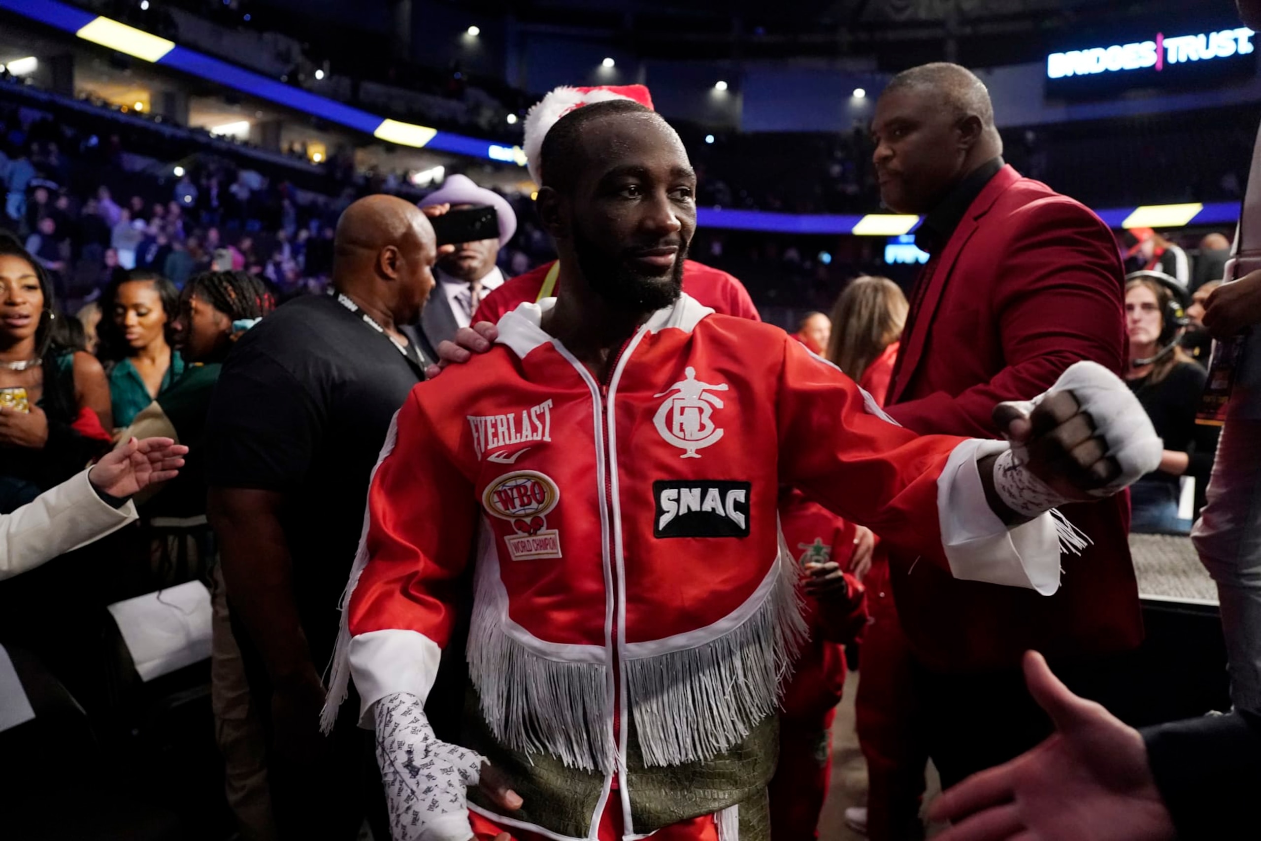 OMAHA, NEBRASKA - DECEMBER 10:  WBO champion Terence Crawford leaves the ring after knocking out David Avanesyan during their welterweight title fight at CHI Health Center on December 10, 2022 in Omaha, Nebraska. (Photo by Ed Zurga/Getty Images)