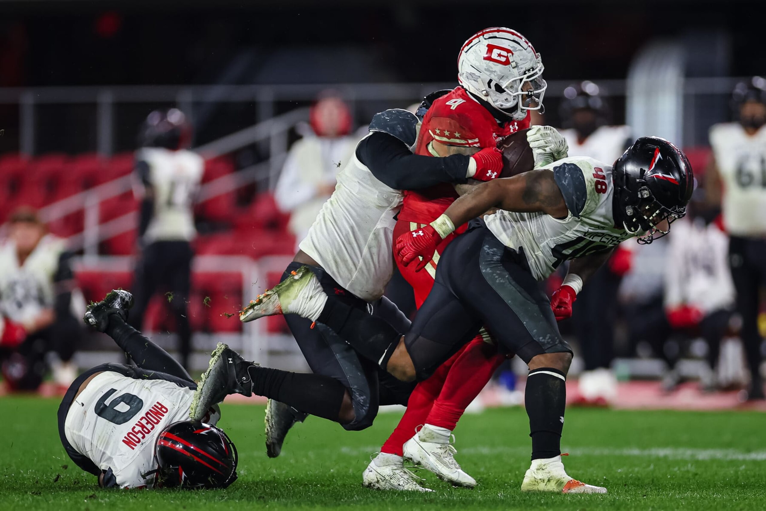 Defenders RB Abram Smith runs through the Vipers