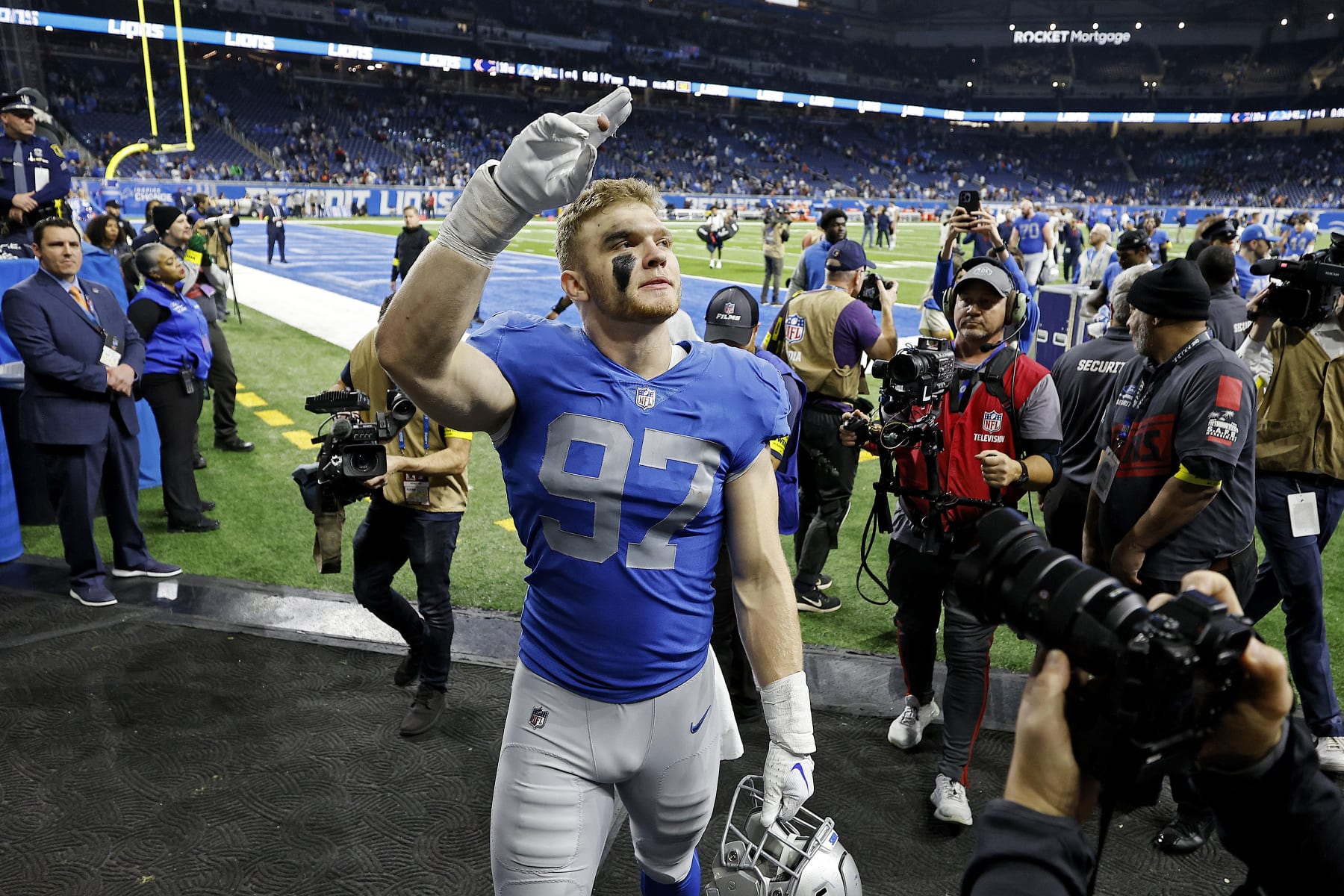 DETROIT, MICHIGAN - JANUARY 01: Aidan Hutchinson #97 of the Detroit Lions waves to fans after the Lions defeated the Chicago Bears, 41-10, at Ford Field on January 01, 2023 in Detroit, Michigan. (Photo by Mike Mulholland/Getty Images)