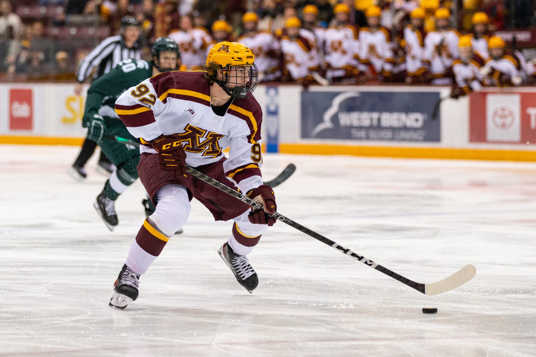 MINNEAPOLIS, MN - JANUARY 27: Minnesota Gophers forward Logan Cooley (92) skates with the puck during the college hockey game between the Michigan State Spartans and the Minnesota Gophers on January 27th, 2022, at 3M Arena at Mariucci in Minneapolis, MN. (Photo by Bailey Hillesheim/Icon Sportswire via Getty Images)(Photo by Bailey Hillesheim/Icon Sportswire via Getty Images)