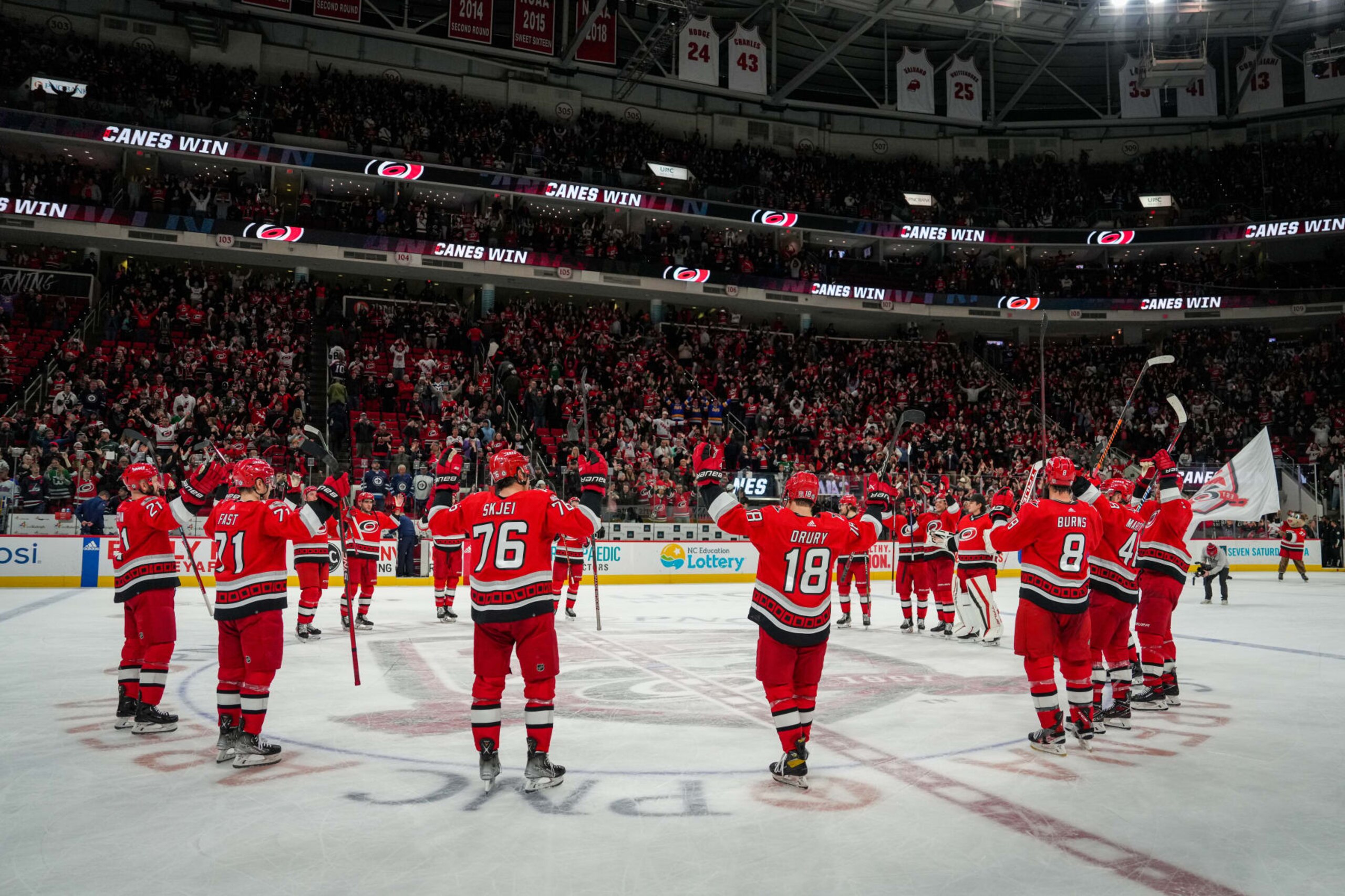 RALEIGH, NORTH CAROLINA - MARCH 14: The Carolina Hurricanes celebrate with the Storm Surge after defeating the Winnipeg Jets at PNC Arena on March 14, 2023 in Raleigh, North Carolina. (Photo by Josh Lavallee/NHLI via Getty Images) RALEIGH, NORTH CAROLINA - MARCH 14: The Carolina Hurricanes celebrate with the Storm Surge after defeating the Winnipeg Jets at PNC Arena on March 14, 2023 in Raleigh, North Carolina. (Photo by Josh Lavallee/NHLI via Getty Images)