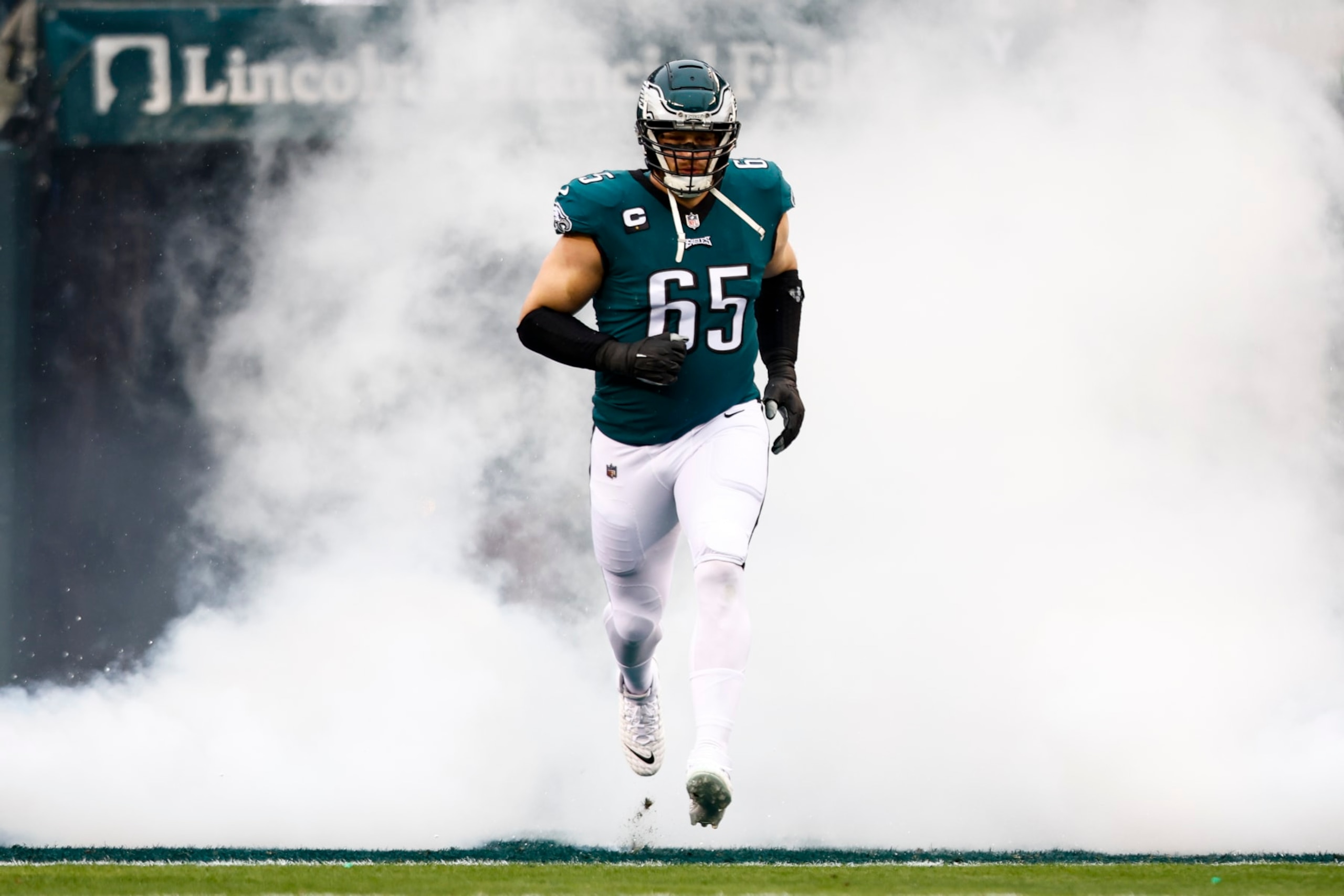 PHILADELPHIA, PA - JANUARY 29: Lane Johnson #65 of the Philadelphia Eagles runs out of the tunnel prior to the NFC Championship NFL football game against the San Francisco 49ers at Lincoln Financial Field on January 29, 2023 in Philadelphia, Pennsylvania. (Photo by Kevin Sabitus/Getty Images)
