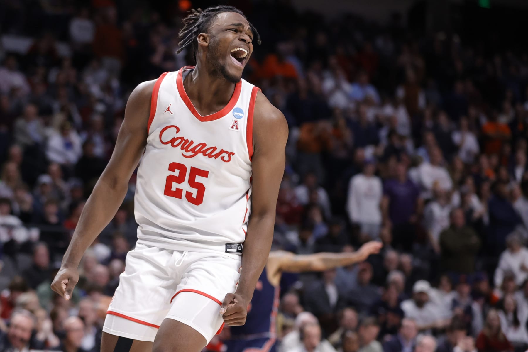 BIRMINGHAM, ALABAMA - MARCH 18: Jarace Walker #25 of the Houston Cougars celebrates during the second half against the Auburn Tigers in the second round of the NCAA Men's Basketball Tournament at Legacy Arena at the BJCC on March 18, 2023 in Birmingham, Alabama. (Photo by Alex Slitz/Getty Images)