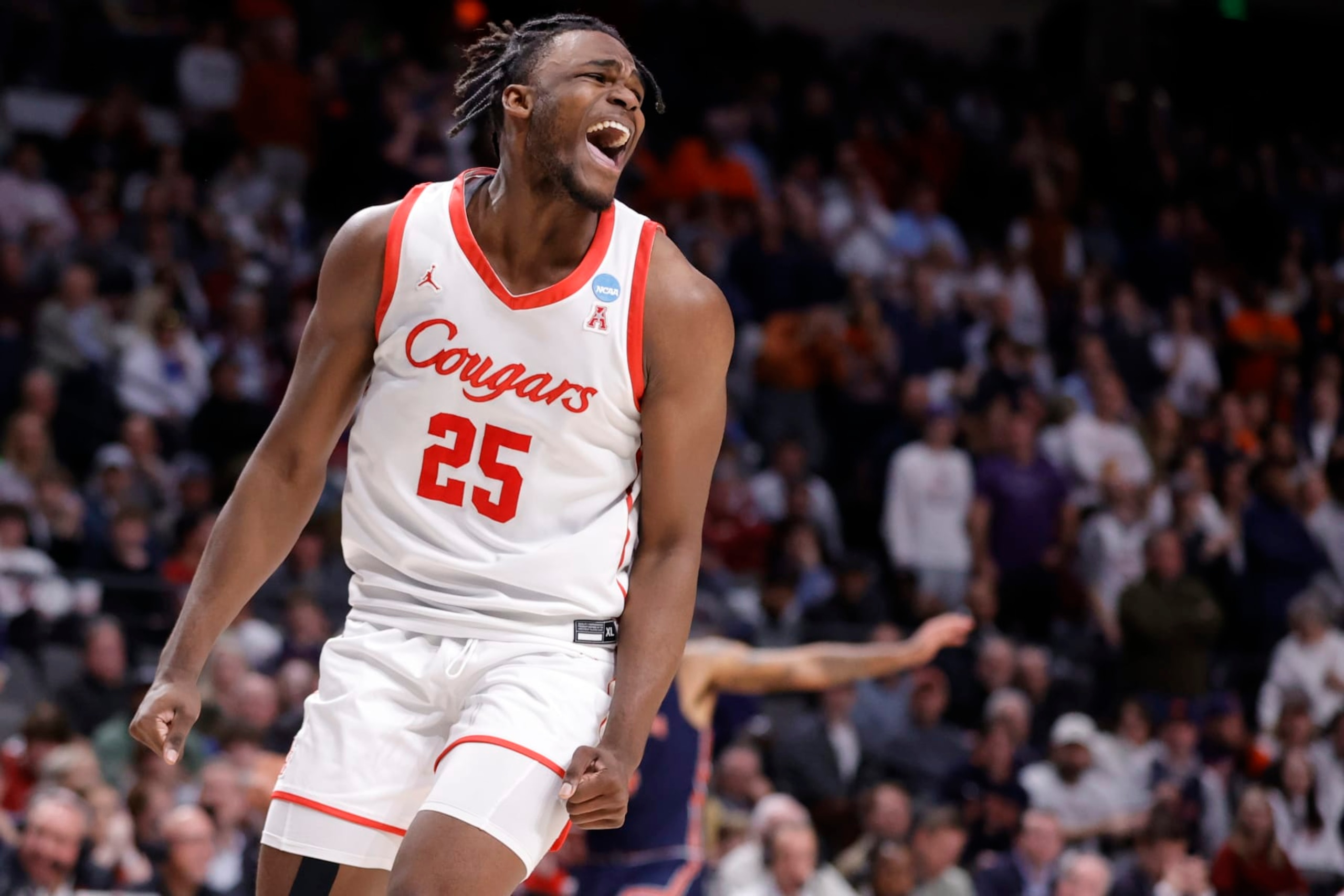 BIRMINGHAM, ALABAMA - MARCH 18: Jarace Walker #25 of the Houston Cougars celebrates during the second half against the Auburn Tigers in the second round of the NCAA Men's Basketball Tournament at Legacy Arena at the BJCC on March 18, 2023 in Birmingham, Alabama. (Photo by Alex Slitz/Getty Images)