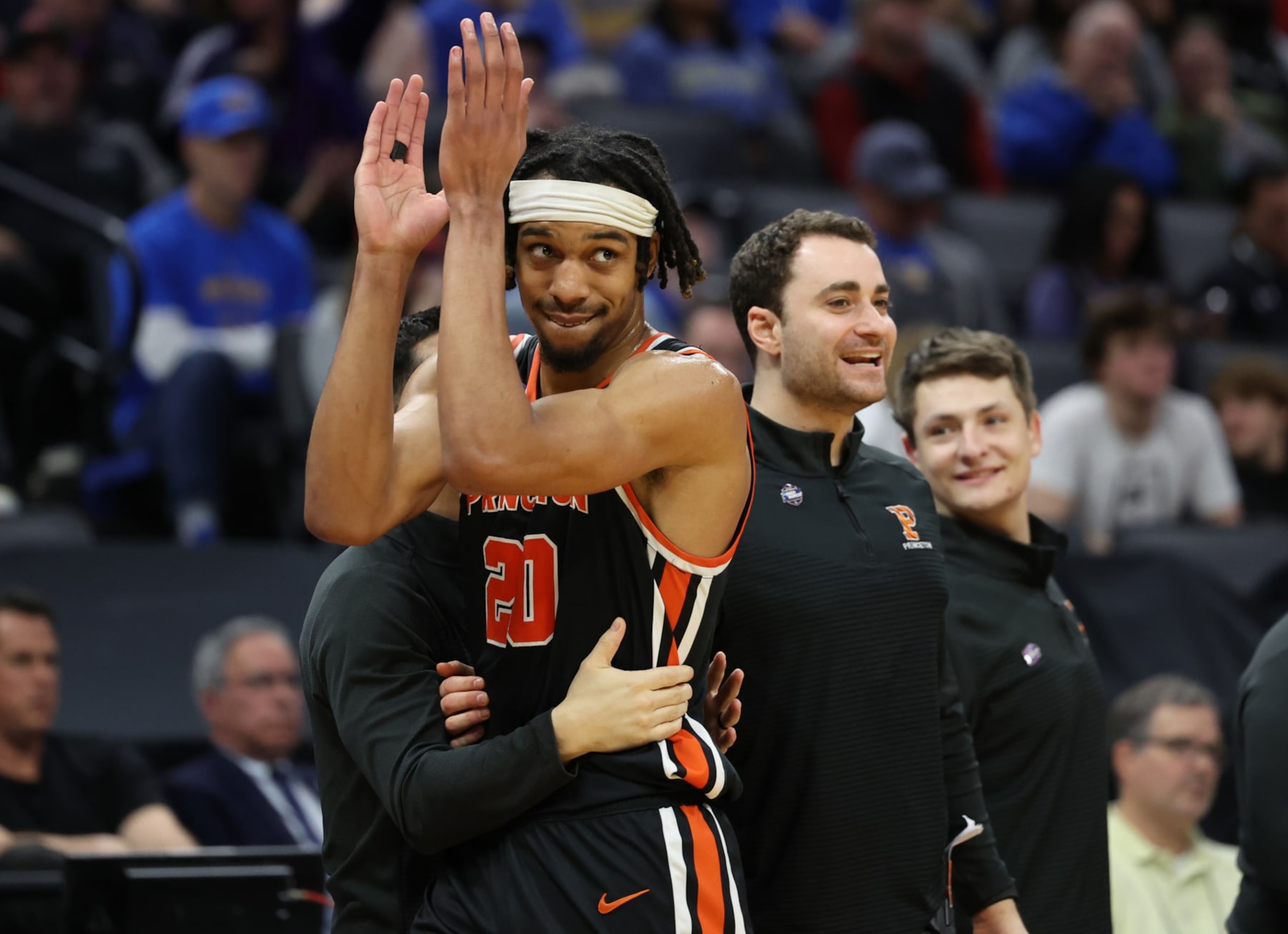 SACRAMENTO, CALIFORNIA - MARCH 18: Tosan Evbuomwan #20 of the Princeton Tigers reacts on the bench during the second half against the Missouri Tigers in the second round of the NCAA Men's Basketball Tournament at Golden 1 Center on March 18, 2023 in Sacramento, California. (Photo by Ezra Shaw/Getty Images)