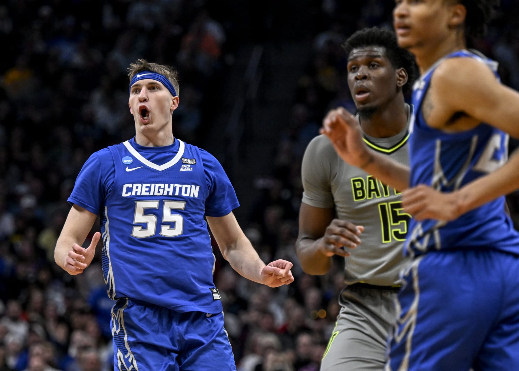 DENVER, CO - MARCH 19: Baylor Scheierman (55) of the Creighton Bluejays watches after shooting over Josh Ojianwuna (15) of the Baylor Bears during the second half of Creightons 85-76 second round NCAA mens basketball tournament win at Ball Arena in Denver on Sunday, March 19, 2023. (Photo by AAron Ontiveroz/MediaNews Group/The Denver Post via Getty Images)