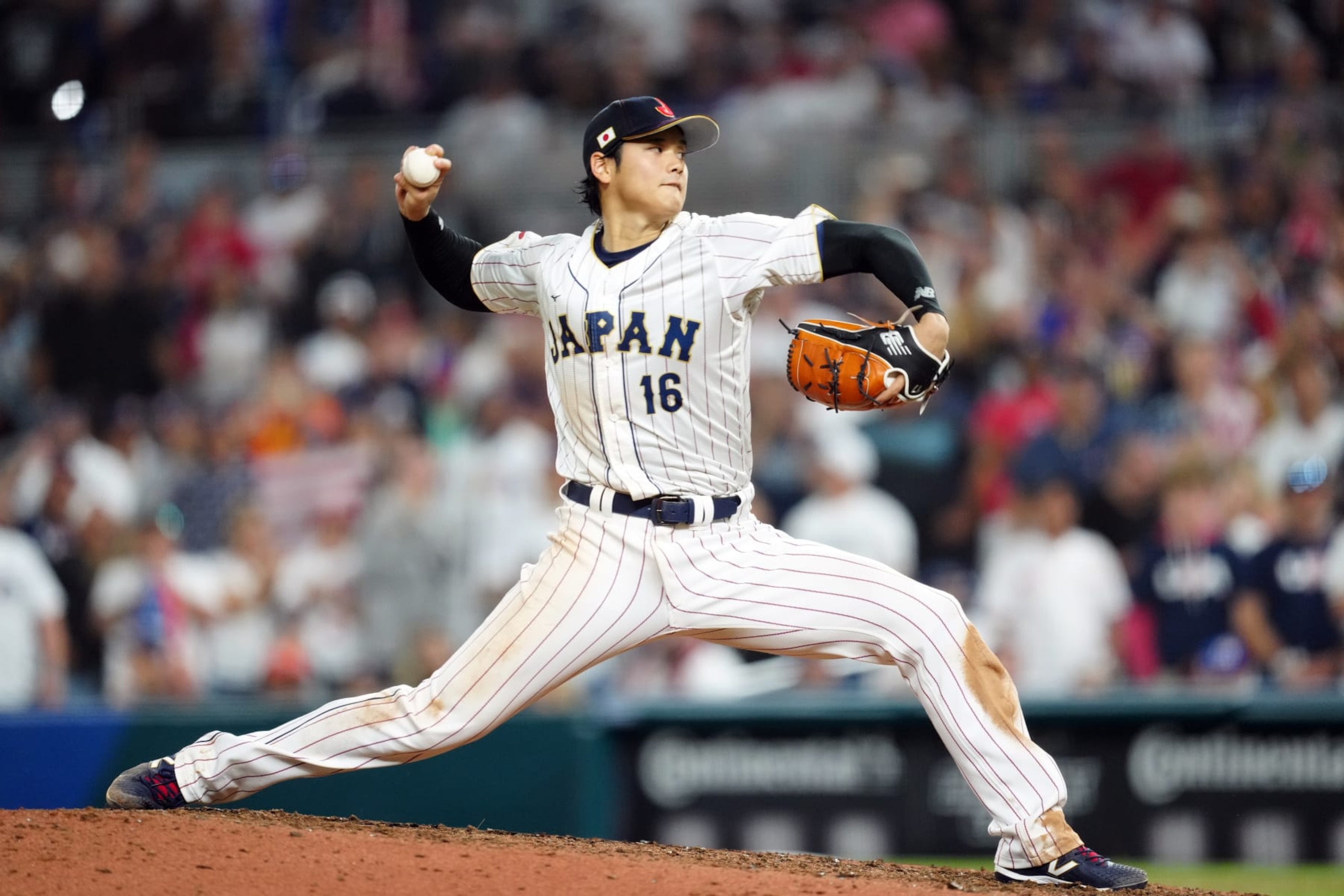 MIAMI, FL - MARCH 21:  Shohei Ohtani #16 of Team Japan pitches during the 2023 World Baseball Classic Championship game between Team USA and Team Japan at loanDepot Park on Tuesday, March 21, 2023 in Miami, Florida. (Photo by Mary DeCicco/WBCI/MLB Photos via Getty Images)