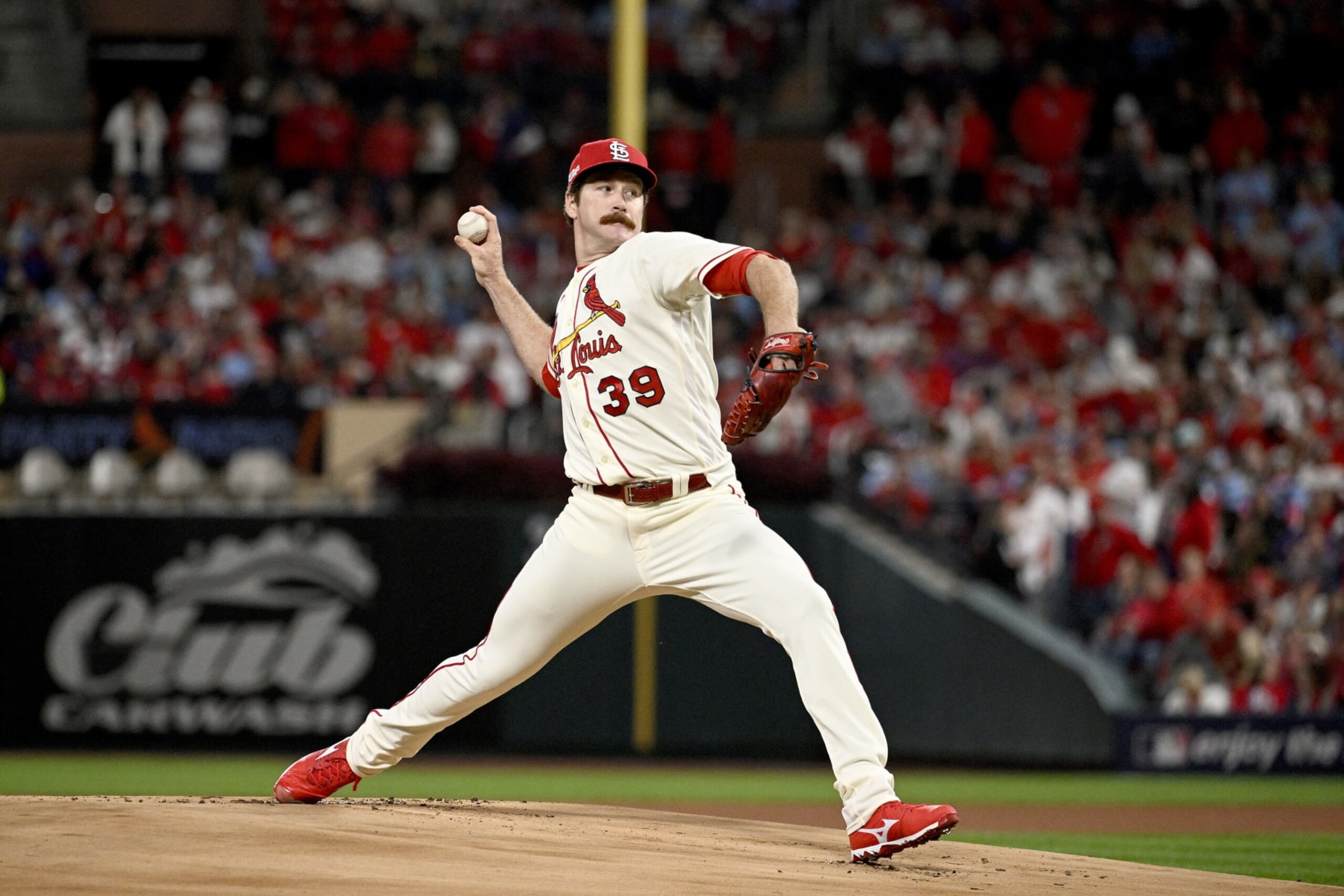 ST LOUIS, MISSOURI - OCTOBER 08: Miles Mikolas #39 of the St. Louis Cardinals throws a pitch against the Philadelphia Phillies during the first inning in game two of the National League Wild Card Series at Busch Stadium on October 08, 2022 in St Louis, Missouri. (Photo by Joe Puetz/Getty Images)