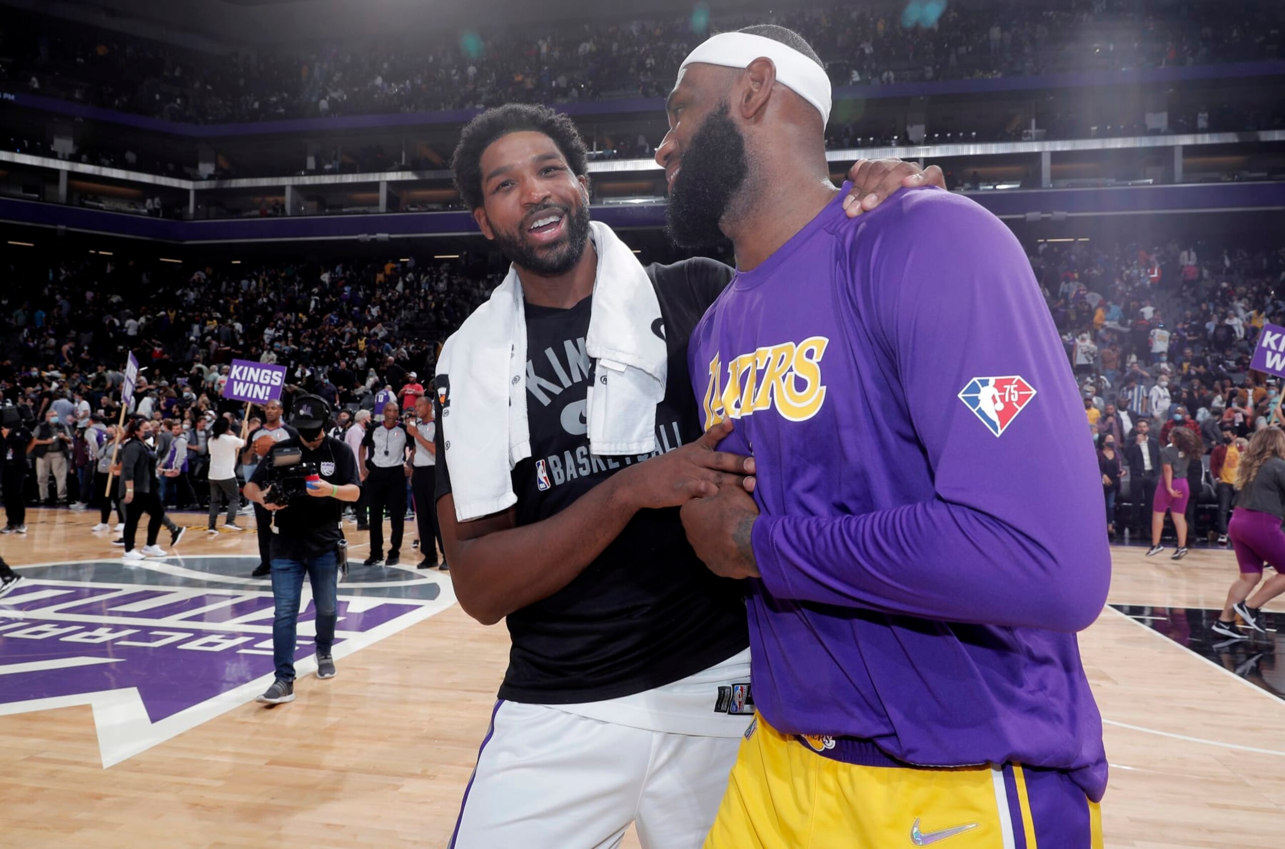 SACRAMENTO, CA - OCTOBER 14: LeBron James #23 of the Los Angeles Lakers talks with Tristan Thompson #13 of the Sacramento Kings on October 14, 2021 at Golden 1 Center in Sacramento, California. NOTE TO USER: User expressly acknowledges and agrees that, by downloading and or using this photograph, User is consenting to the terms and conditions of the Getty Images Agreement. Mandatory Copyright Notice: Copyright 2021 NBAE (Photo by Rocky Widner/NBAE via Getty Images)