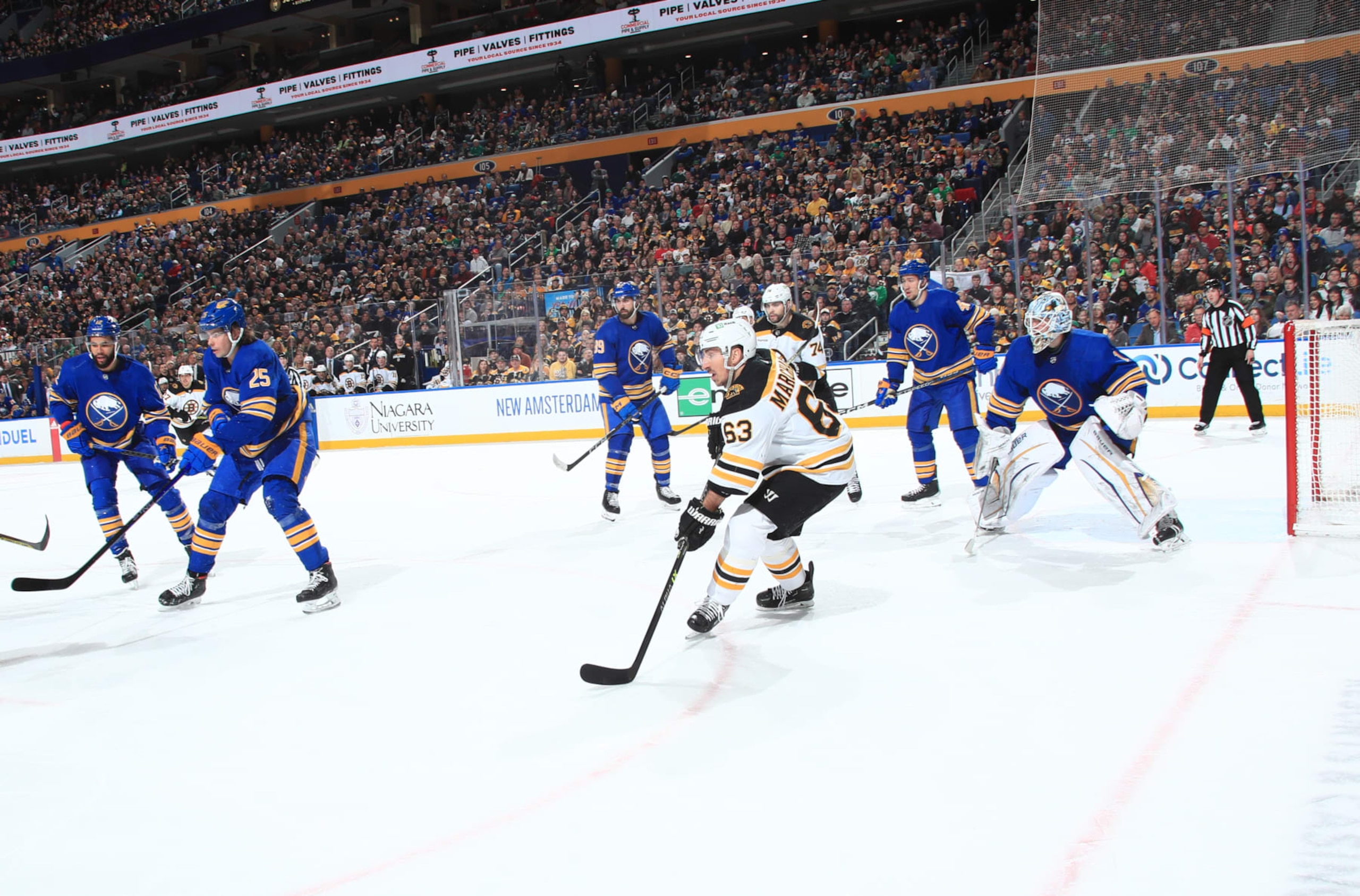 Buffalo Sabres defend against the Boston Bruins.