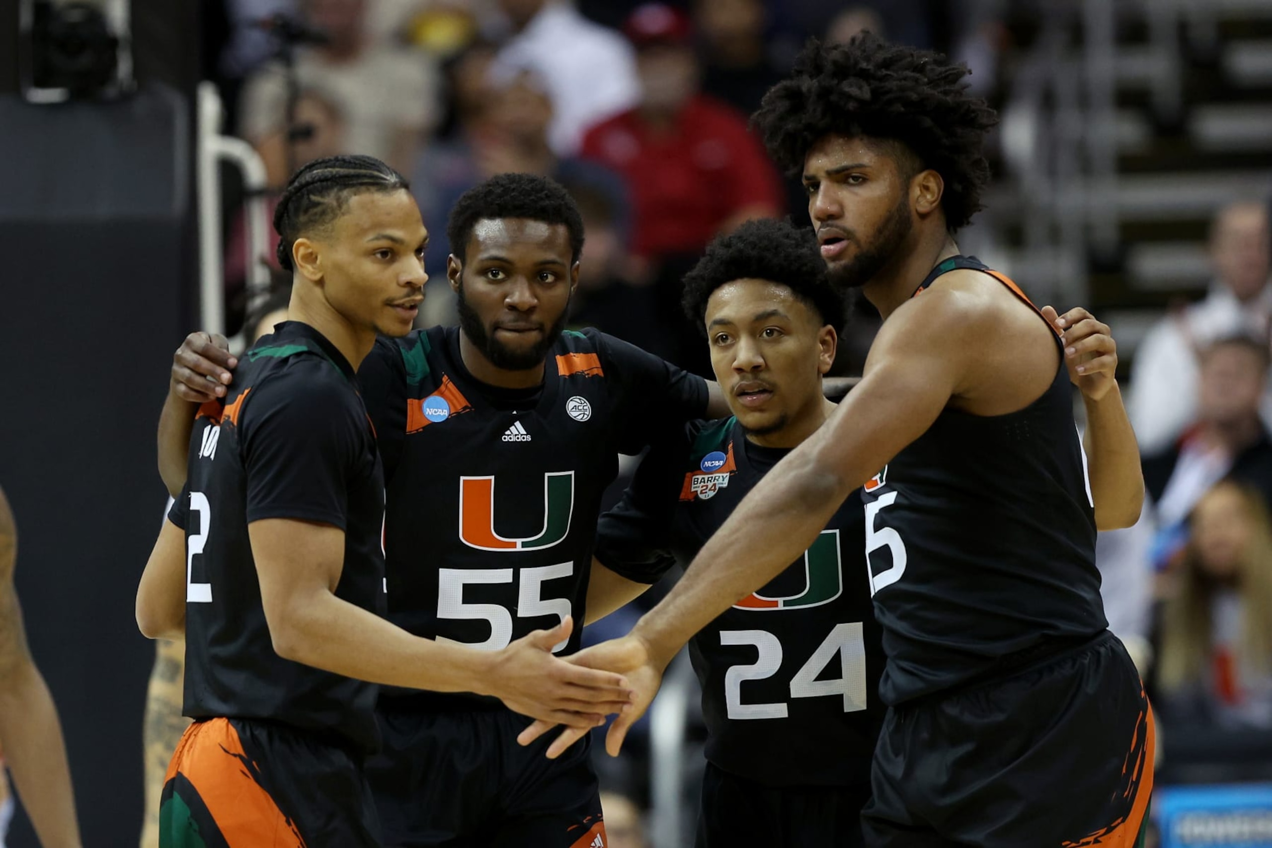 From left to right: Isaiah Wong, Wooga Poplar, Nijel Pack and Norchad Omier of Miami 